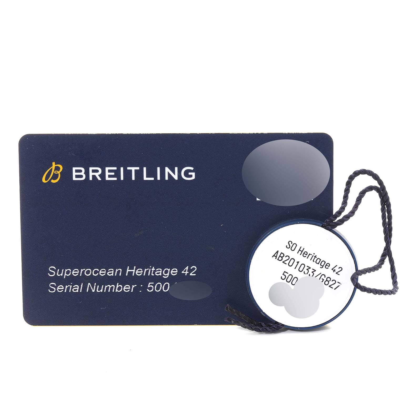 The image shows the Breitling Superocean AB201033/G827 Men's Stainless Steel Silver Dial AB201033/G827 Men's Stainless Steel Silver Dial Heritage 42 model warranty card and hangtag, with serial numbers partially obscured.