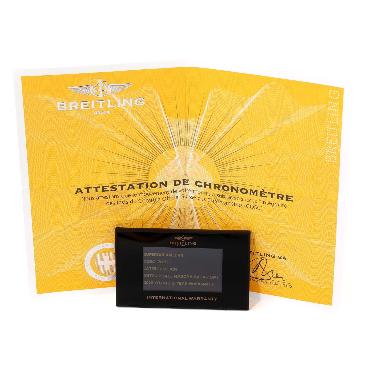 The image shows the warranty card and chronometer certificate for the Breitling Superocean A17392 Men's Stainless Steel Blue Dial A17392 Men's Stainless Steel Blue Dial II 44 watch.