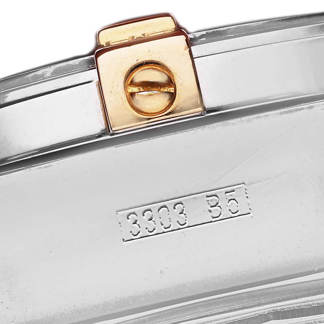 The image shows the clasp and part of the bracelet of a Breitling Windrider B13355 Men's Steel and Gold (two tone) Blue Dial watch from a close-up angle.