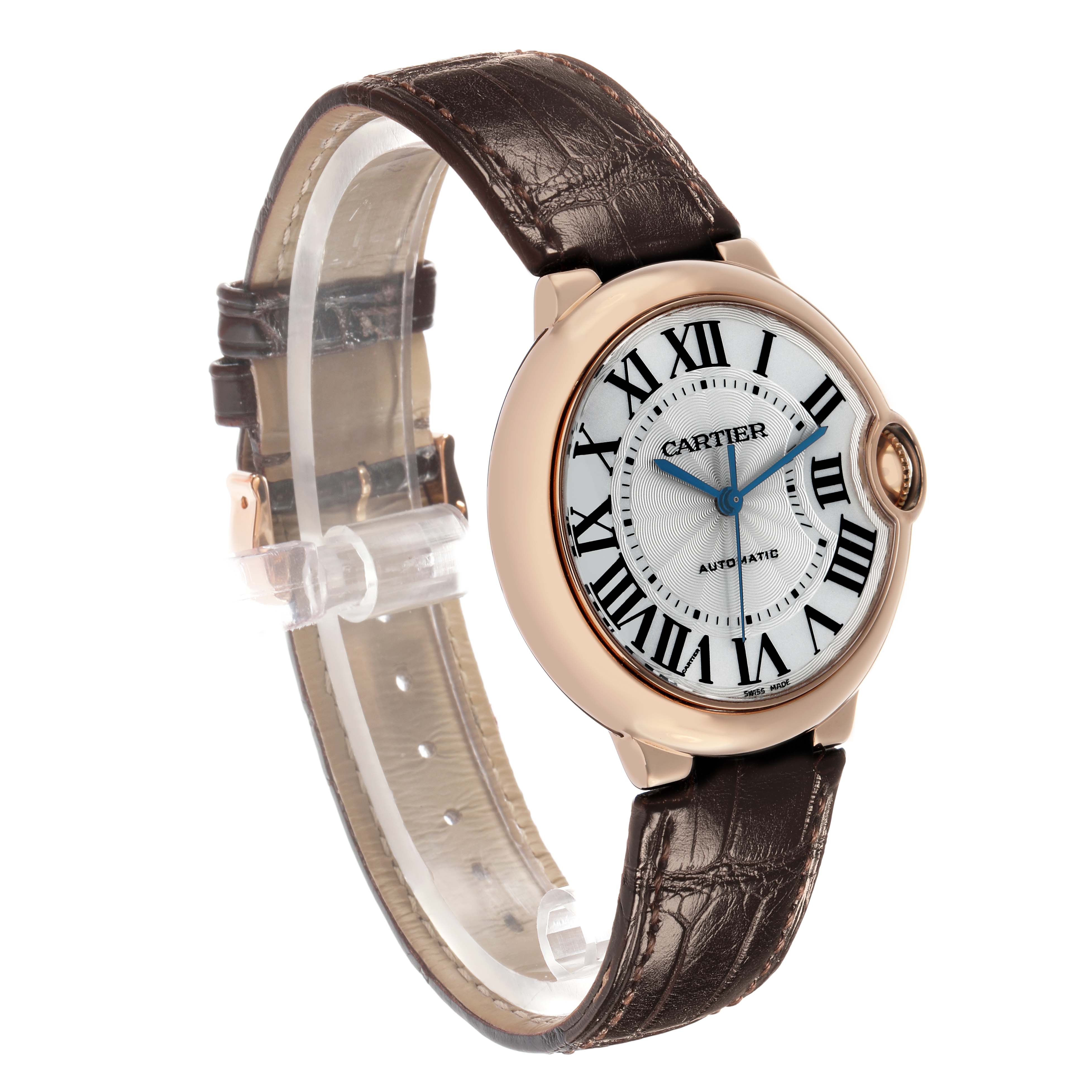 The Cartier Ballon Bleu WGBB0009 Women's Rose Gold Silver Dial watch is shown at a three-quarter angle, highlighting the face, crown, and brown leather strap.