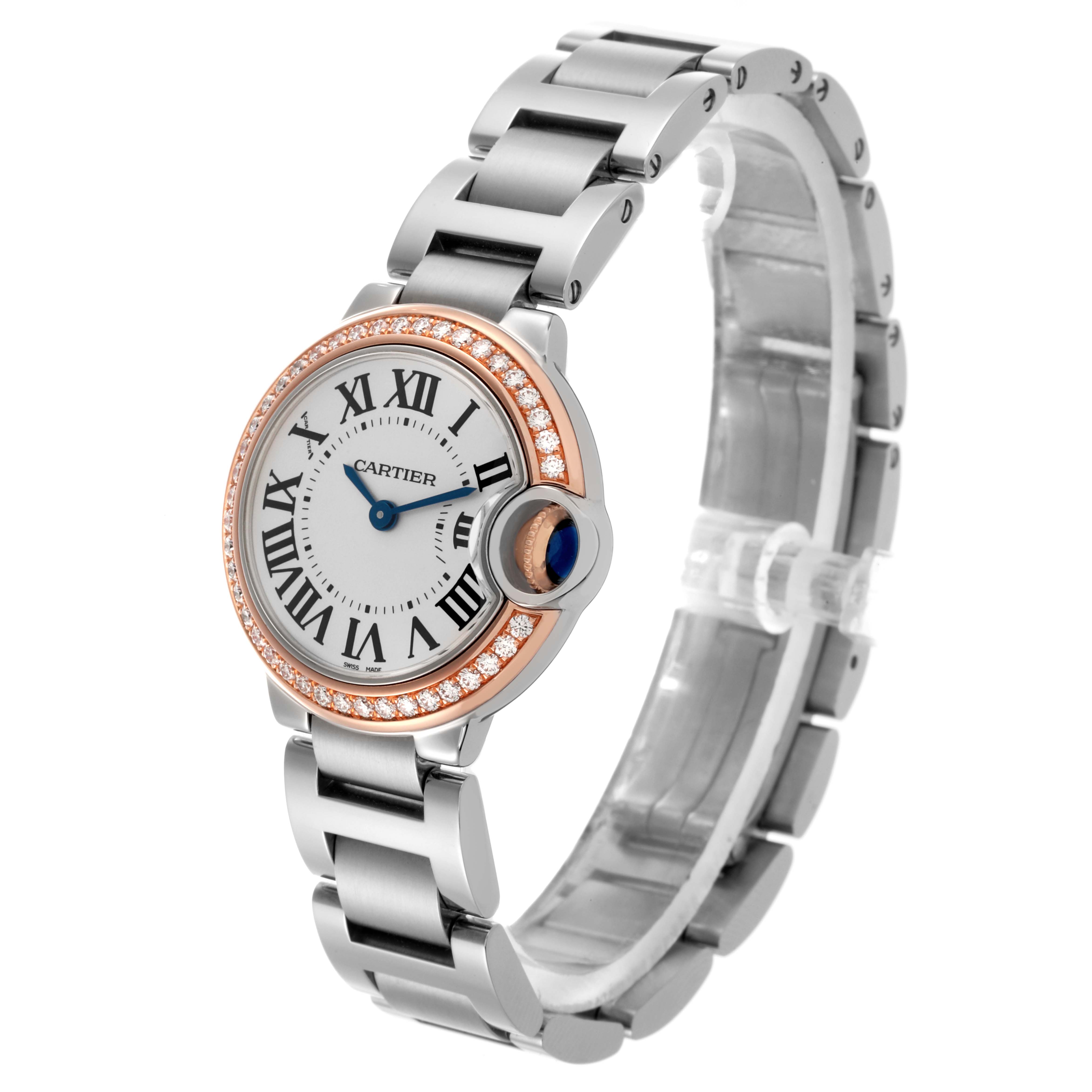 The Cartier Ballon Bleu WE902079 Women's Steel and Gold (two tone) Silver Dial WE902079 Women's Steel and Gold (two tone) Silver Dial watch is shown at a three-quarter angle, highlighting the face, bracelet, and diamond bezel.