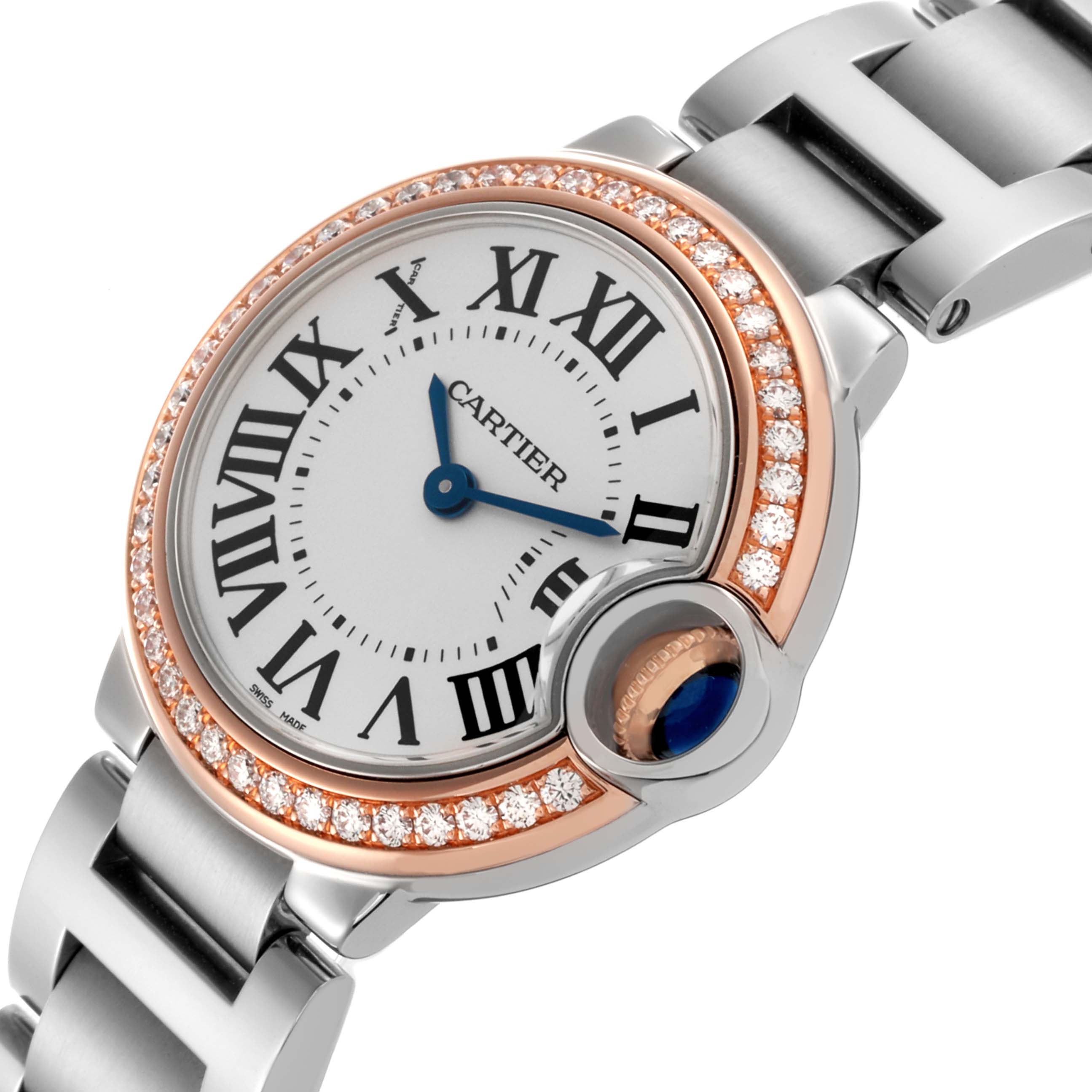 The Cartier Ballon Bleu WE902079 Women's Steel and Gold (two tone) Silver Dial WE902079 Women's Steel and Gold (two tone) Silver Dial watch is shown from an angled side view, highlighting its face, bezel, and part of the bracelet.