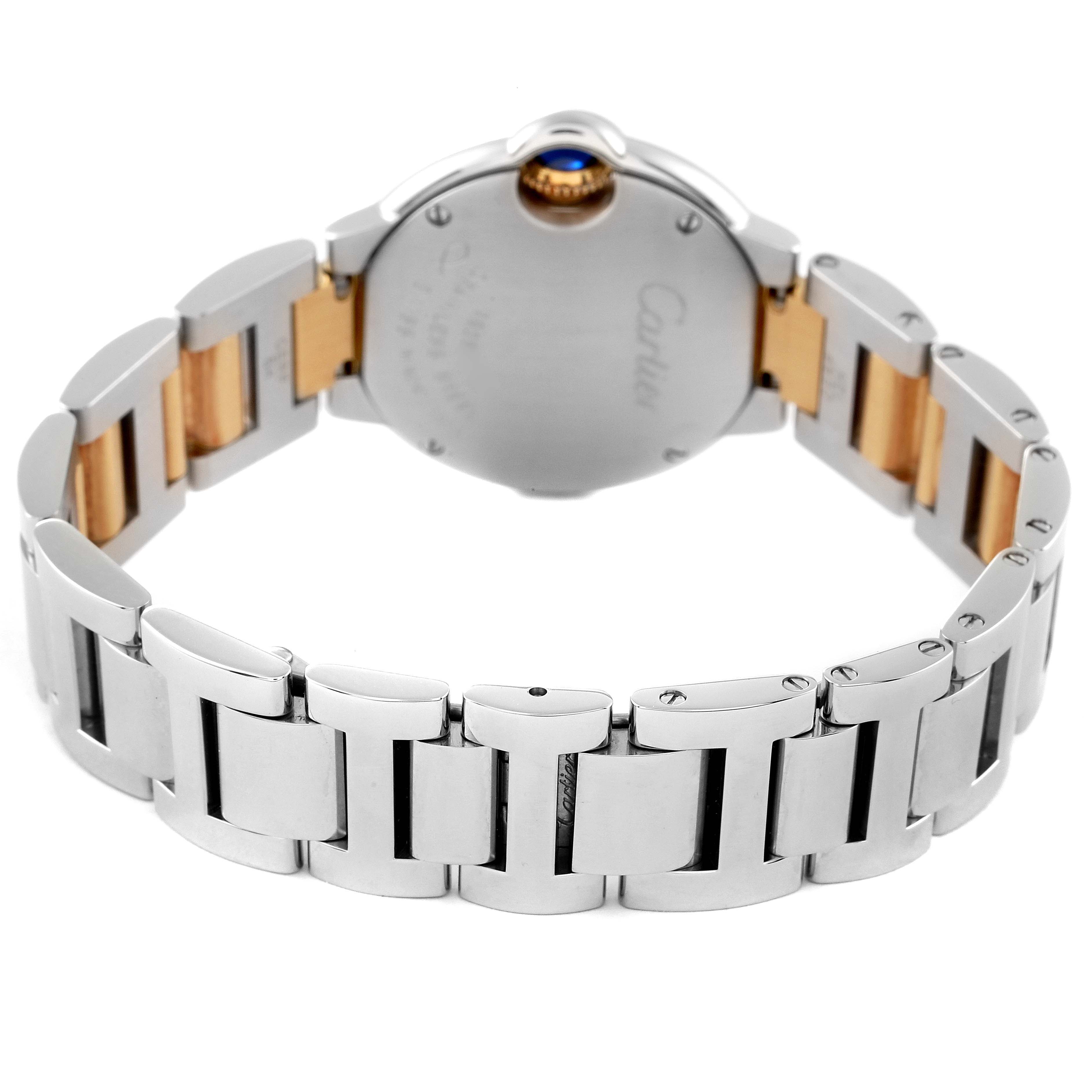 The image shows the back view of a Cartier Ballon Bleu W69007Z3 Women's Steel and Gold (two tone) Silver Dial W69007Z3 Women's Steel and Gold (two tone) Silver Dial watch, focusing on the case back and two-tone bracelet.