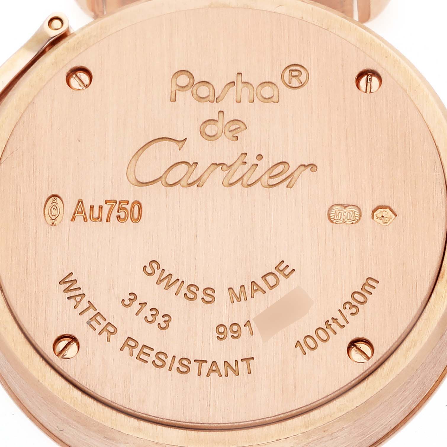 The image shows the case back of a Cartier Pasha WJ124019 Women's Rose Gold Silver Dial watch, highlighting engravings and markings like "Swiss Made" and "Water Resistant".
