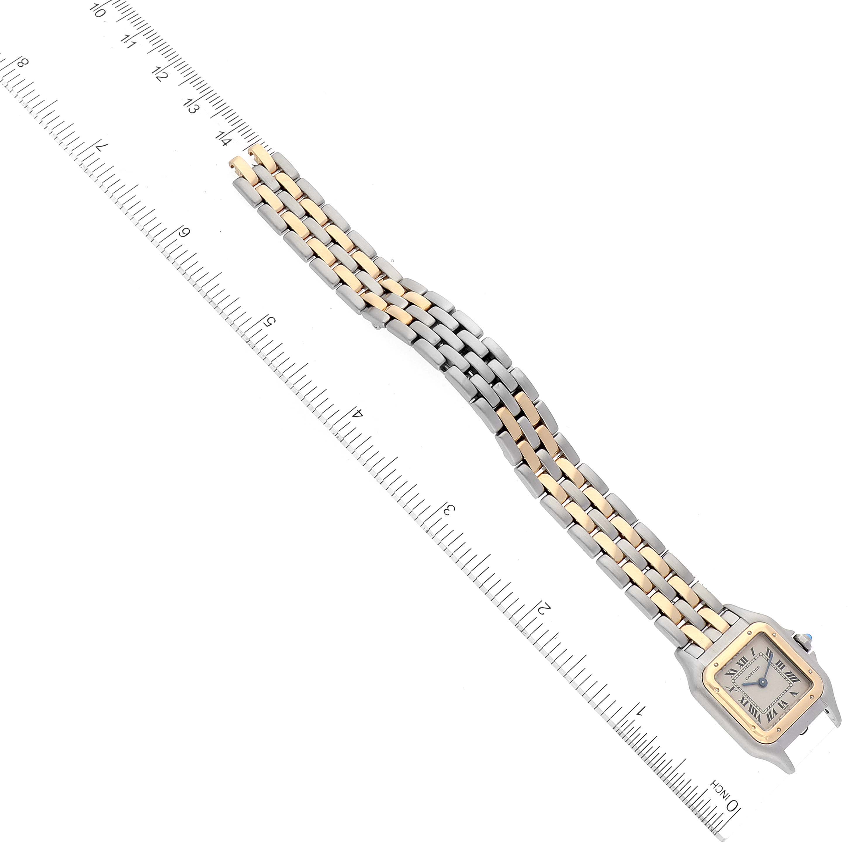 The image shows an overhead view of a Cartier Panthere W25029B6 Women's Steel and Gold (two tone) Silver Dial W25029B6 Women's Steel and Gold (two tone) Silver Dial watch with a two-tone bracelet placed next to a ruler for scale.