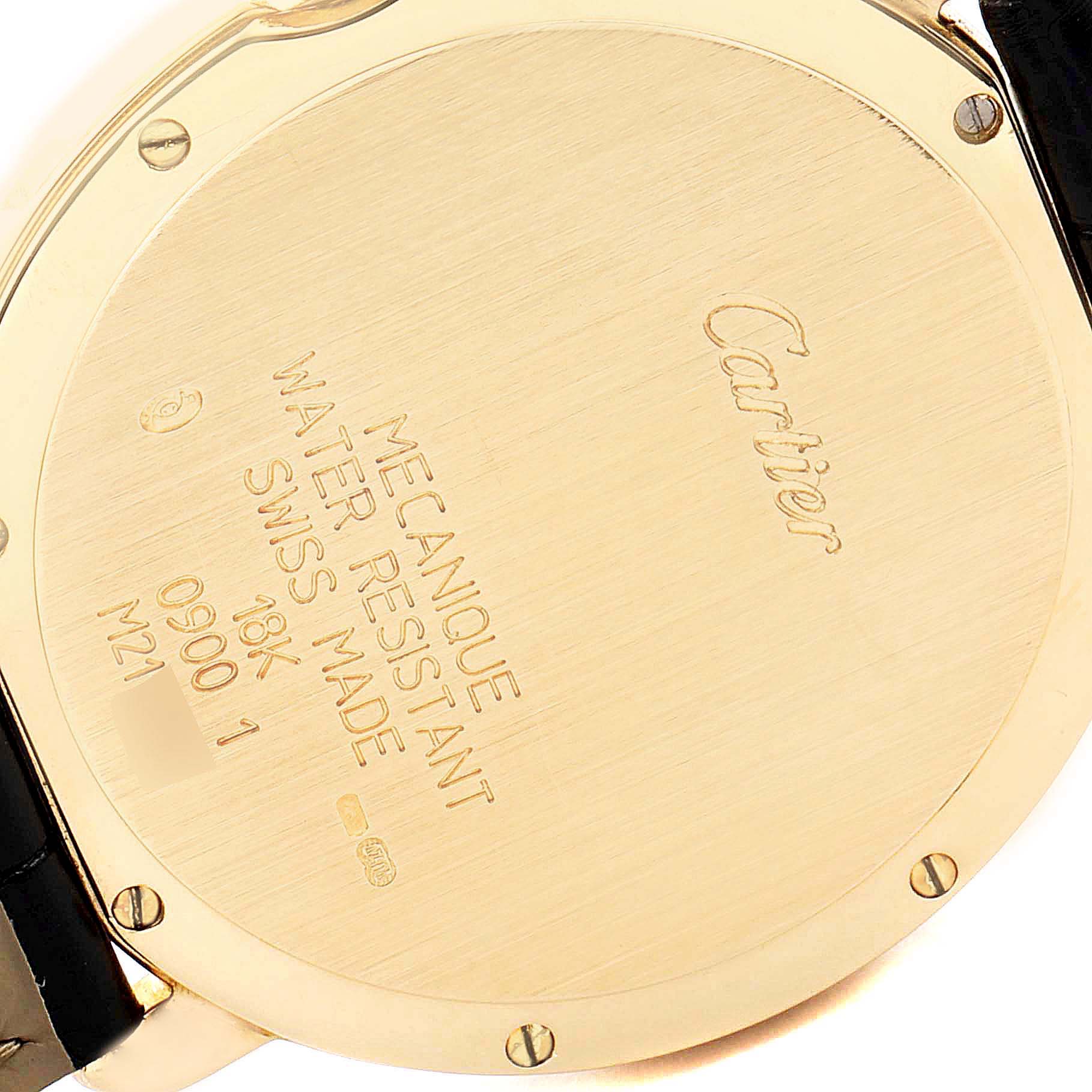 The image shows the back case of a Cartier Ronde 09001 Men's Yellow Gold Silver Dial 09001 Men's Yellow Gold Silver Dial watch, highlighting its engraved details and screws.