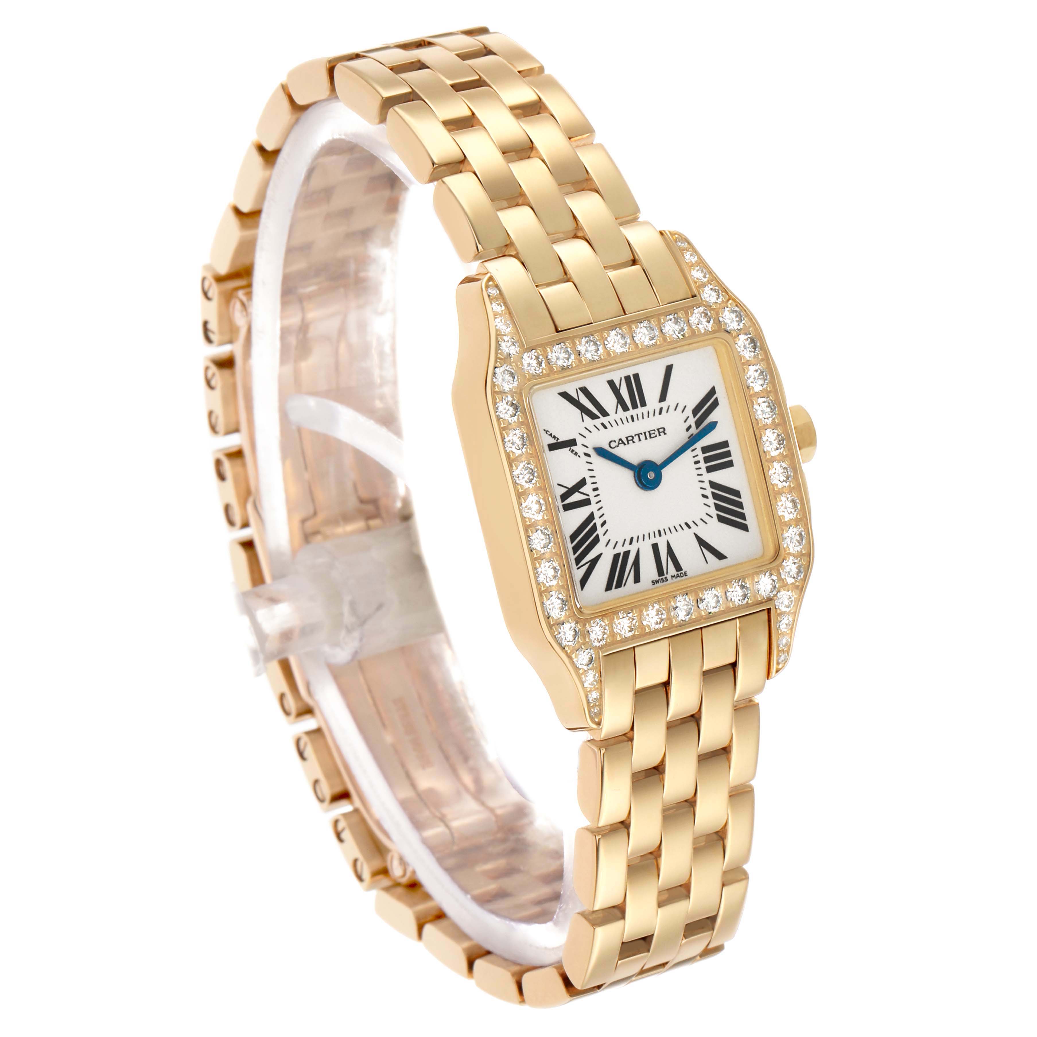 The image shows a Cartier Santos Demoiselle WF9001Y7 Women's Yellow Gold Silver Dial watch at a three-quarter angle, highlighting its diamond-set bezel and gold bracelet.