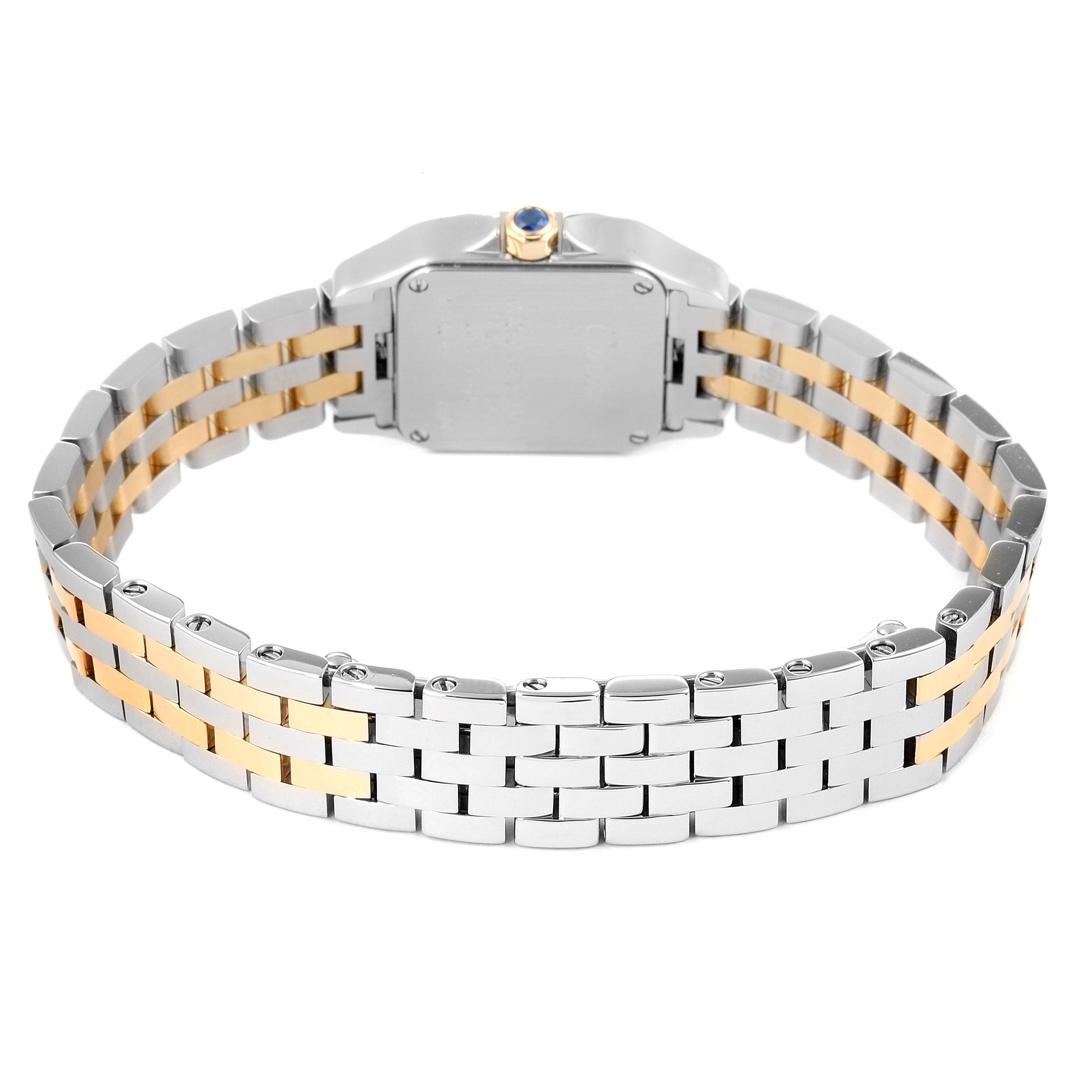 The image shows the back view of a Cartier Santos Demoiselle W25066Z6 Women
s Stainless Steel Silver Dial W25066Z6 Women
s Stainless Steel Silver Dial watch, focusing on its two-tone metal strap and case back.