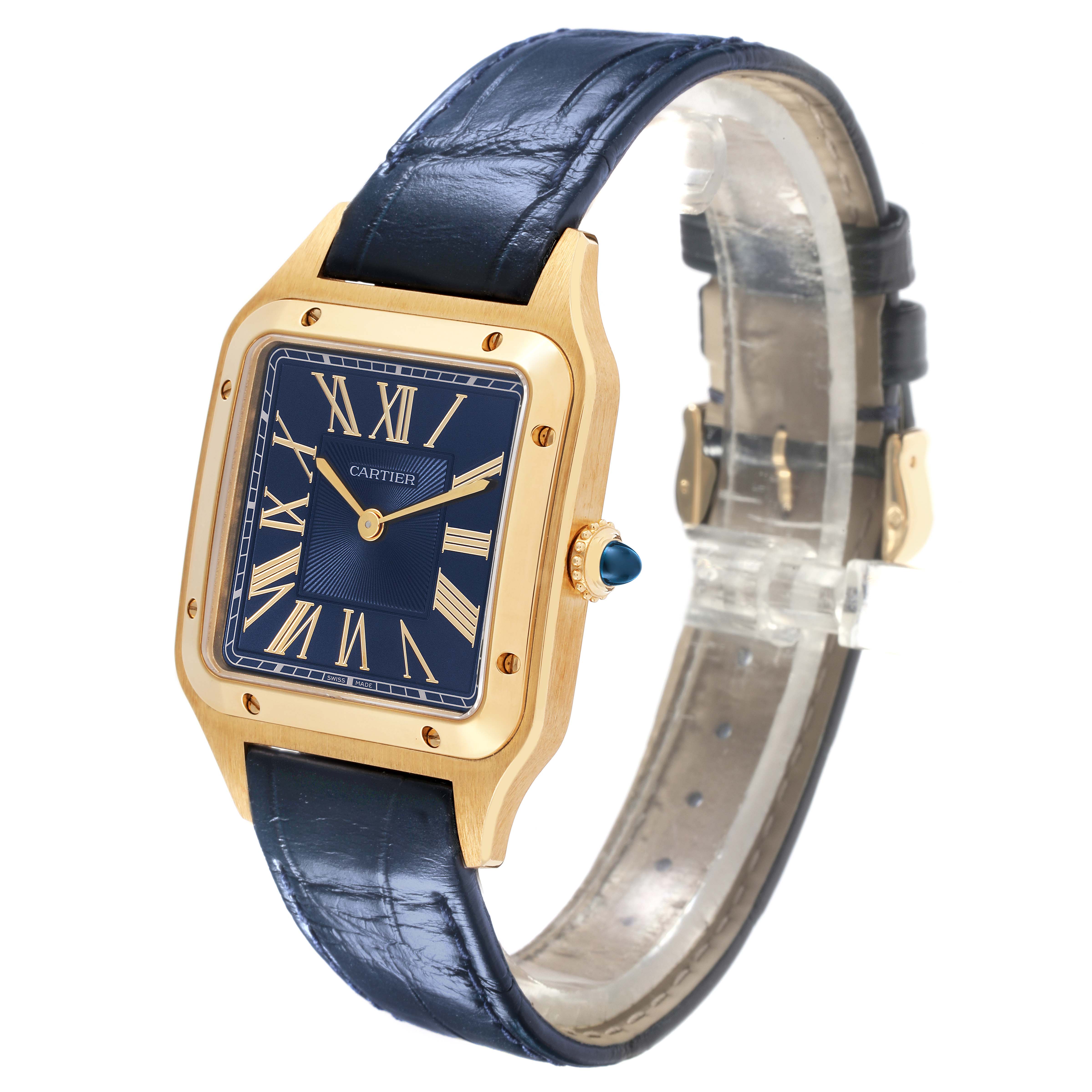 The Cartier Santos Dumont WGSA0077 Men's Yellow Gold Black Dial WGSA0077 Men's Yellow Gold Black Dial watch is shown at an angle highlighting the blue dial, gold case, crown, and blue leather strap.