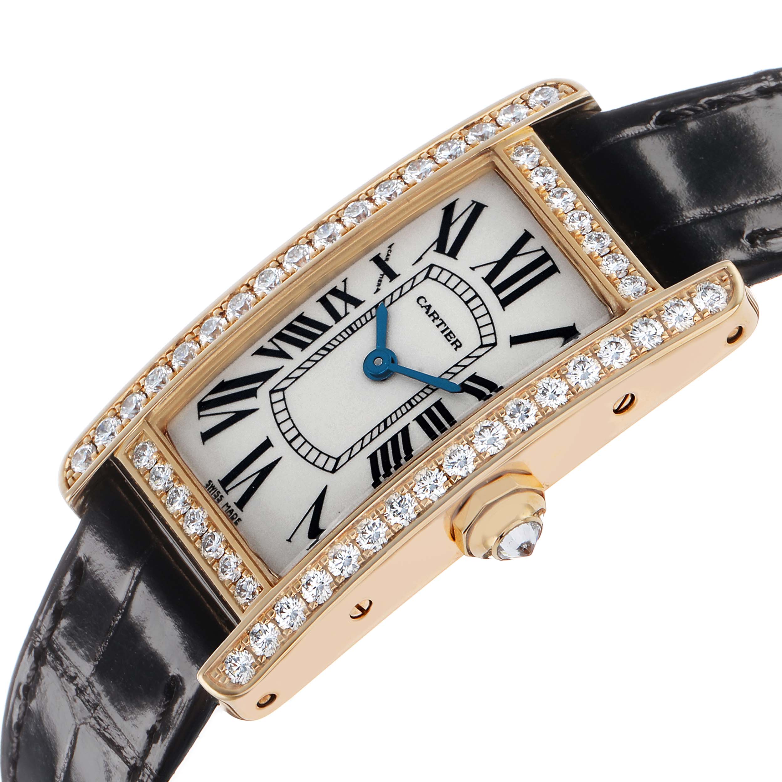 The Cartier Tank Americaine WB707231 Women's Yellow Gold Silver Dial watch is shown at an angle displaying its diamond-set bezel, Roman numeral dial, and black leather strap.