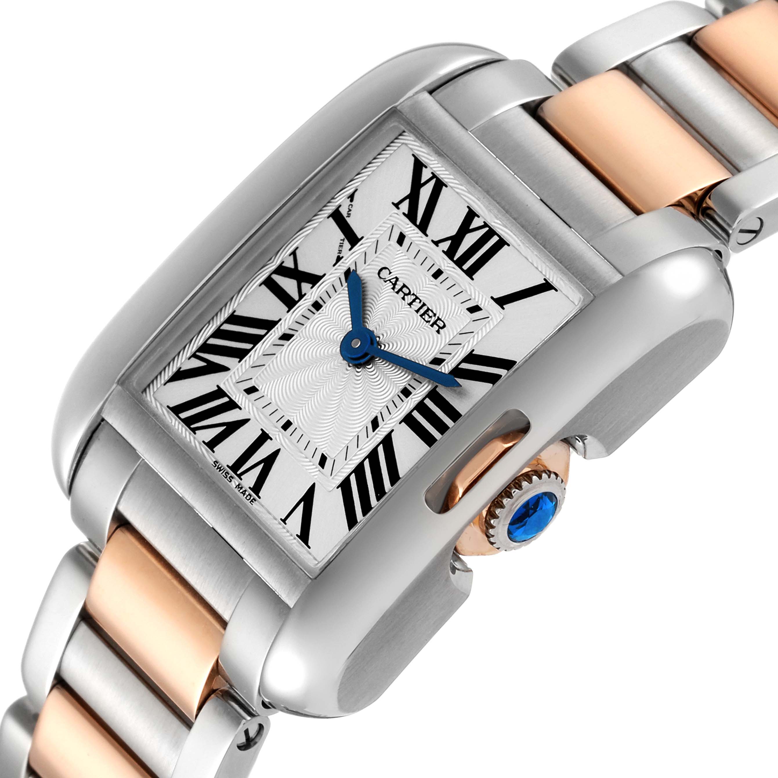 The image shows a close-up angle of the Cartier Tank Anglaise W5310036 Women's Steel and Gold (two tone) Silver Dial W5310036 Women's Steel and Gold (two tone) Silver Dial watch, highlighting its dial, crown, and part of the bracelet.