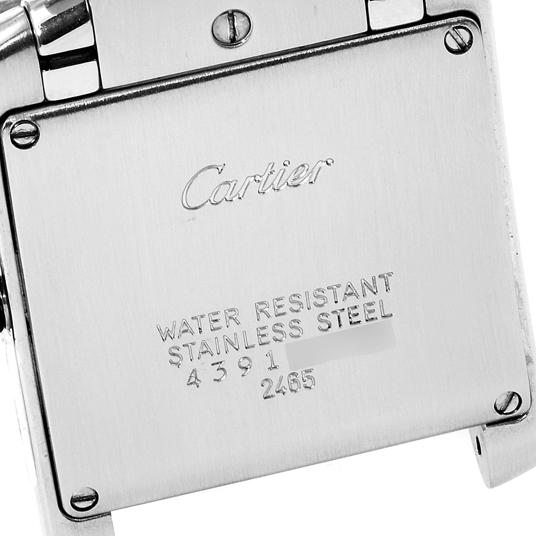 This image shows the brushed stainless steel case back of the Cartier Tank Francaise W51012Q4 Women's Steel and Gold (two tone) Silver Dial W51012Q4 Women's Steel and Gold (two tone) Silver Dial watch, including water resistance details.