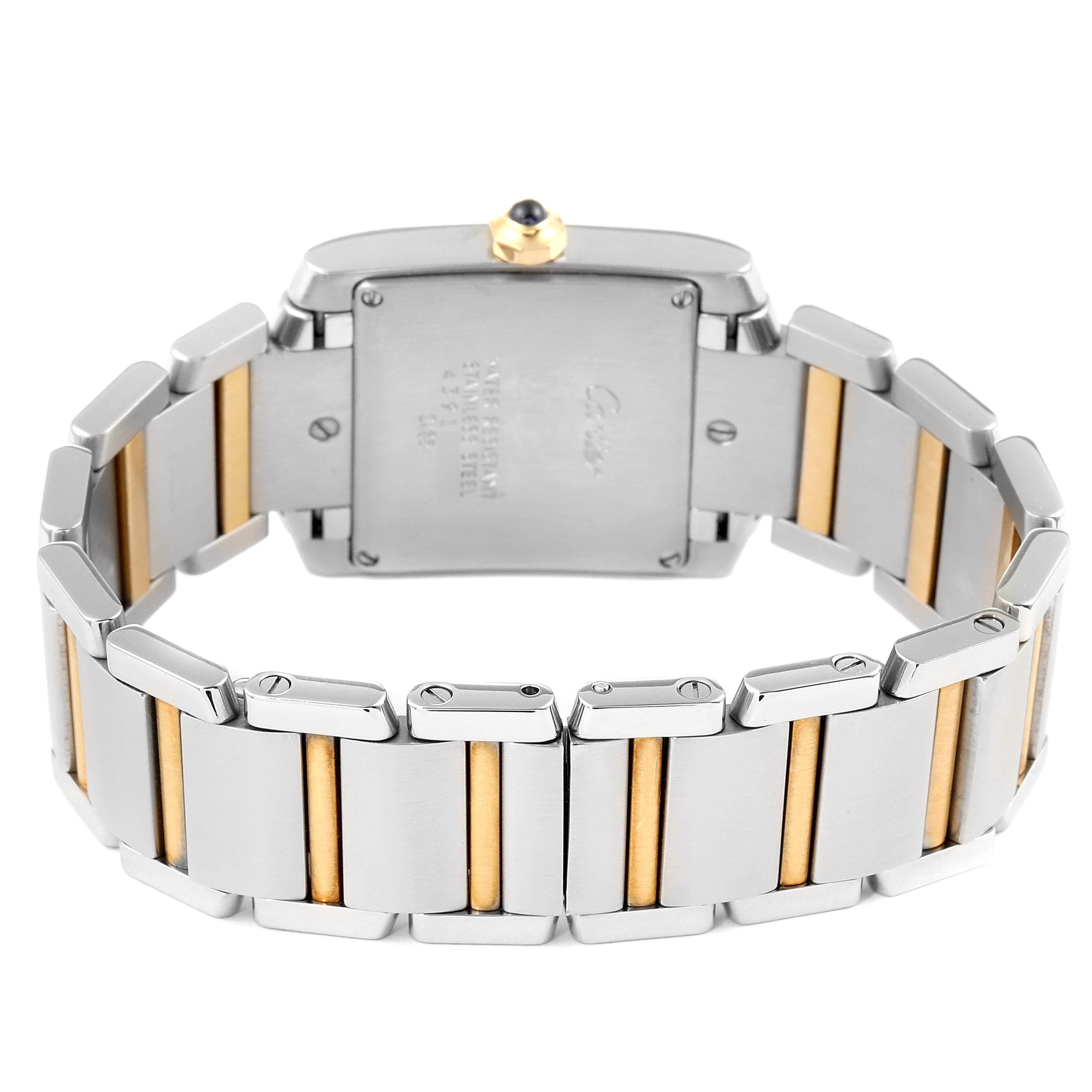 The image shows the back and bracelet of a Cartier Tank Francaise W51012Q4 Women's Steel and Gold (two tone) Silver Dial W51012Q4 Women's Steel and Gold (two tone) Silver Dial watch, highlighting the stainless steel and gold link design.