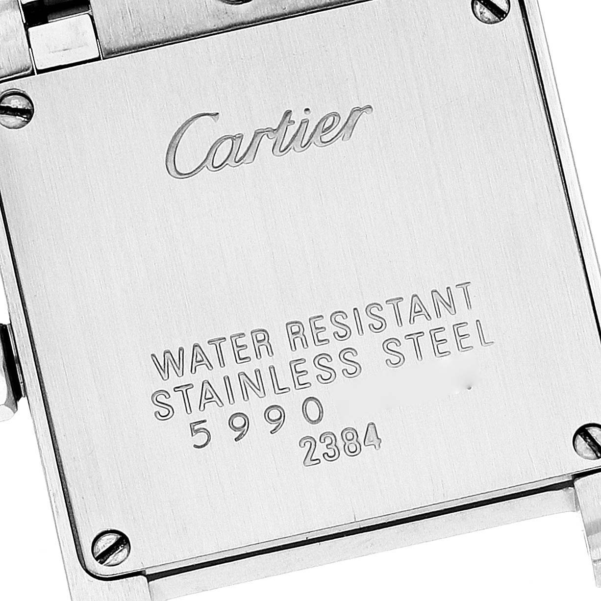 The image shows the back case of a Cartier Tank Francaise W51008Q3 Women's Stainless Steel Silver Dial W51008Q3 Women's Stainless Steel Silver Dial watch, displaying the brand name and material details.