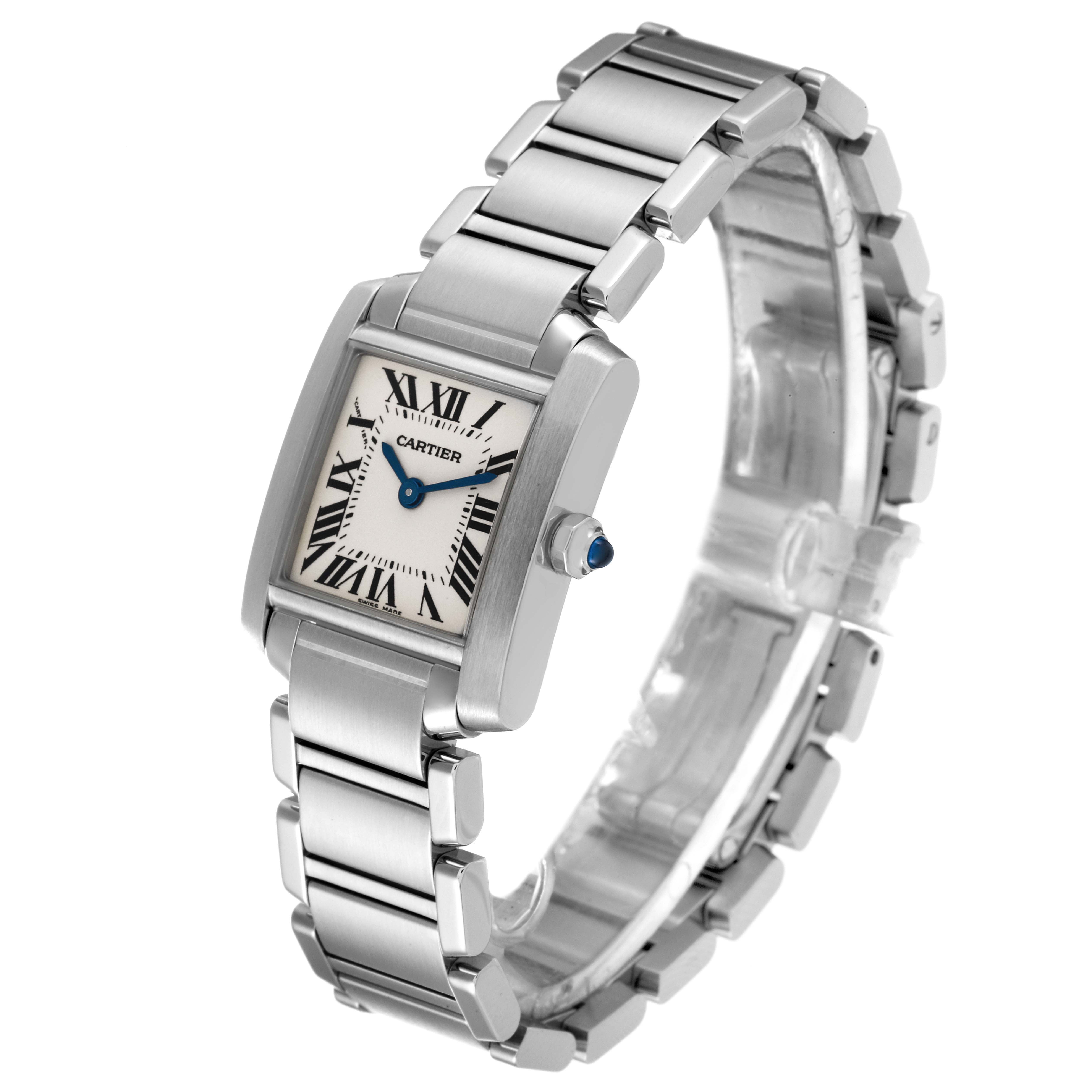 The Tank Française watch by Cartier is displayed at a slight angle, showing its rectangular face, Roman numeral dial, metal bracelet, and crown with a blue gemstone.