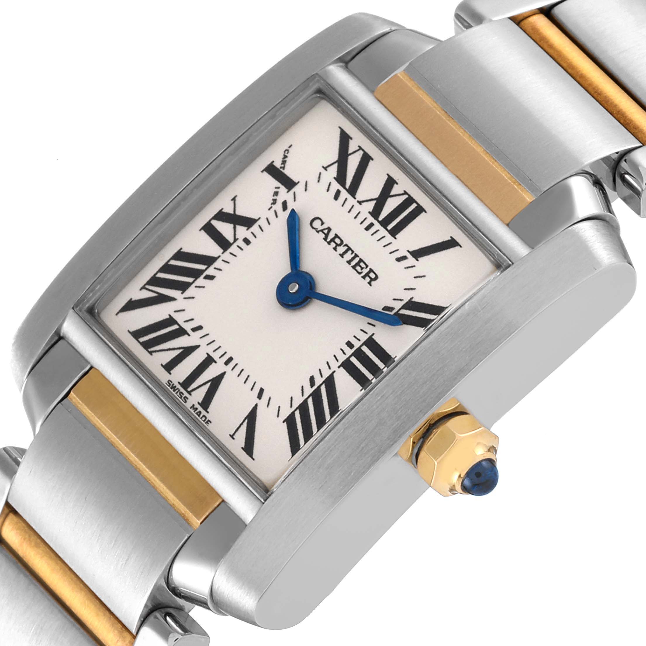This image shows a close-up of the Cartier Tank Francaise W51007Q4 Women's Steel and Gold (two tone) Silver Dial W51007Q4 Women's Steel and Gold (two tone) Silver Dial watch face, bracelet, and crown at an angled perspective.