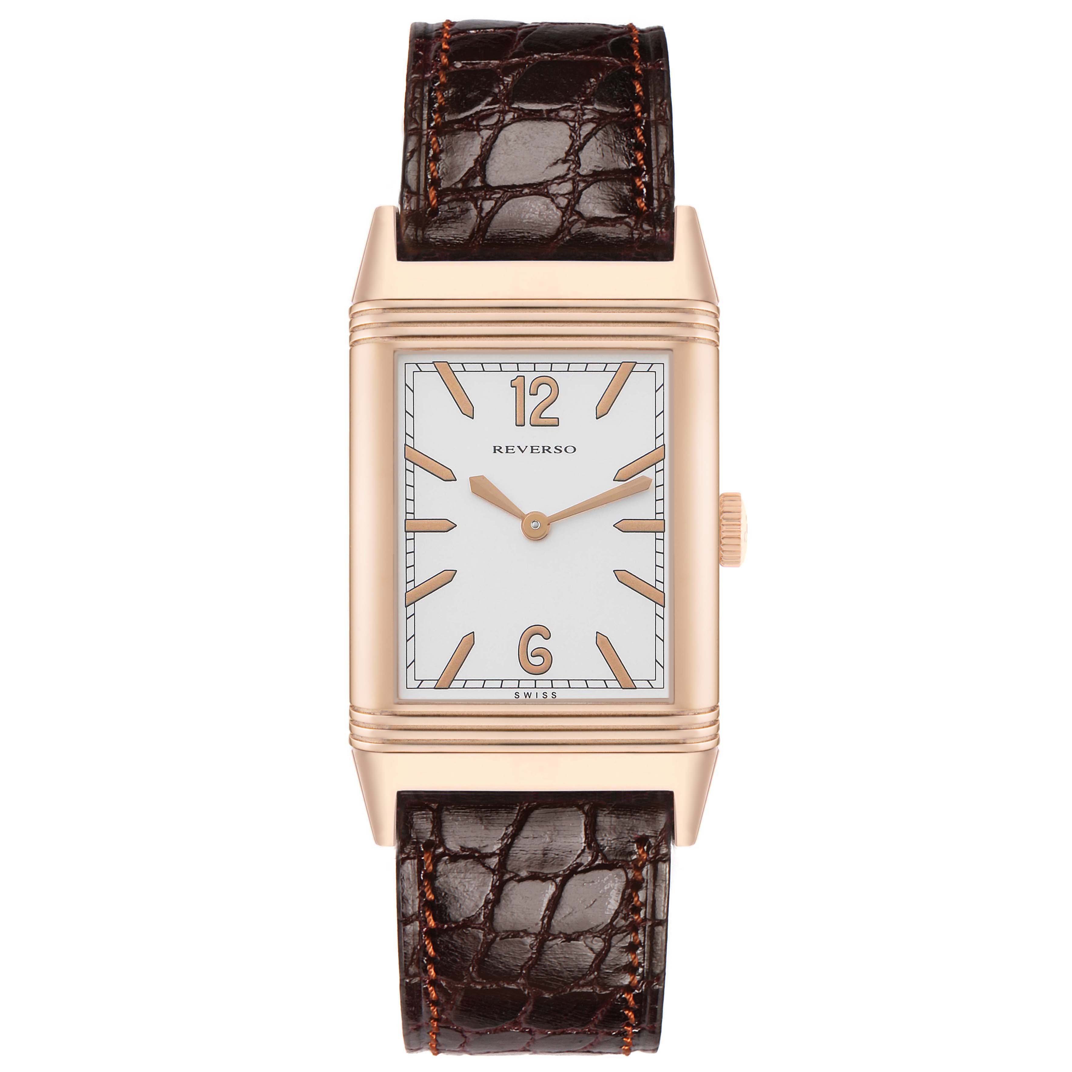 The Jaeger LeCoultre Reverso Q2782521 Men's Rose Gold Silver Dial watch is shown from a top-down angle, displaying its rectangular face, gold case, and brown leather strap.