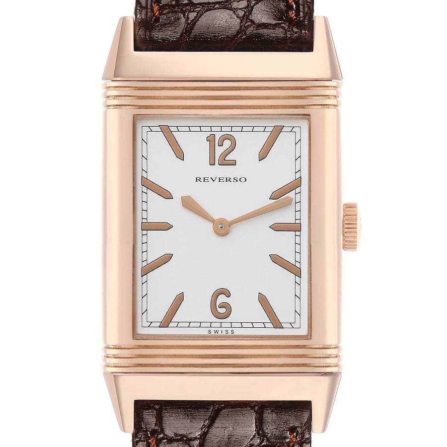 The Jaeger-LeCoultre Reverso watch is shown from the front, highlighting its face, crown, and part of the leather strap.