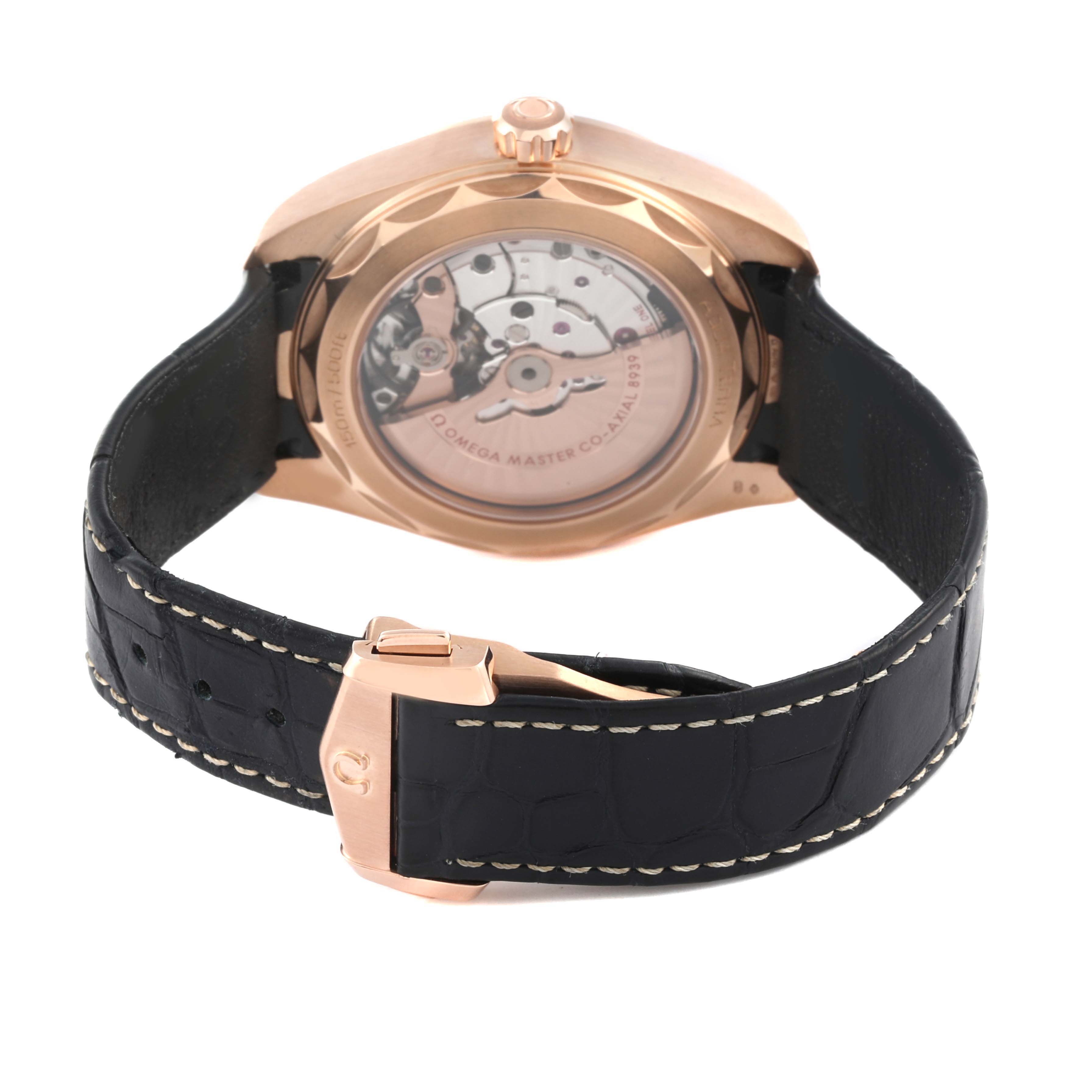 The Omega Aqua Terra 220.53.43.22.02.001 Men's Rose Gold Silver Dial 220.53.43.22.02.001 Men's Rose Gold Silver Dial watch is shown from the back, displaying the movement and clasp.