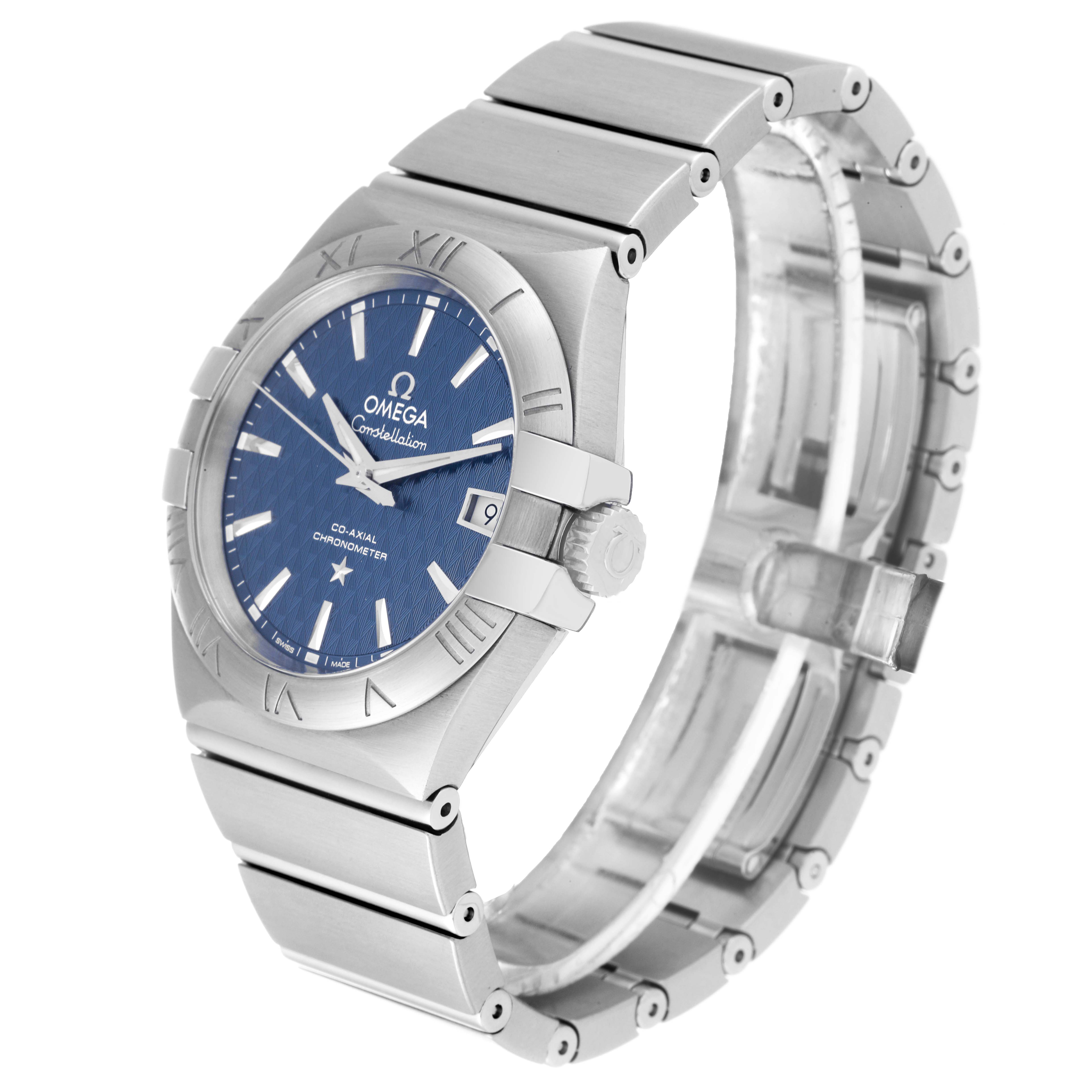 The Omega Constellation 123.10.35.20.03.002 Men's Stainless Steel Blue Dial 123.10.35.20.03.002 Men's Stainless Steel Blue Dial watch is shown at a three-quarter angle, highlighting the face with the date window, crown, and part of the metal bracelet.