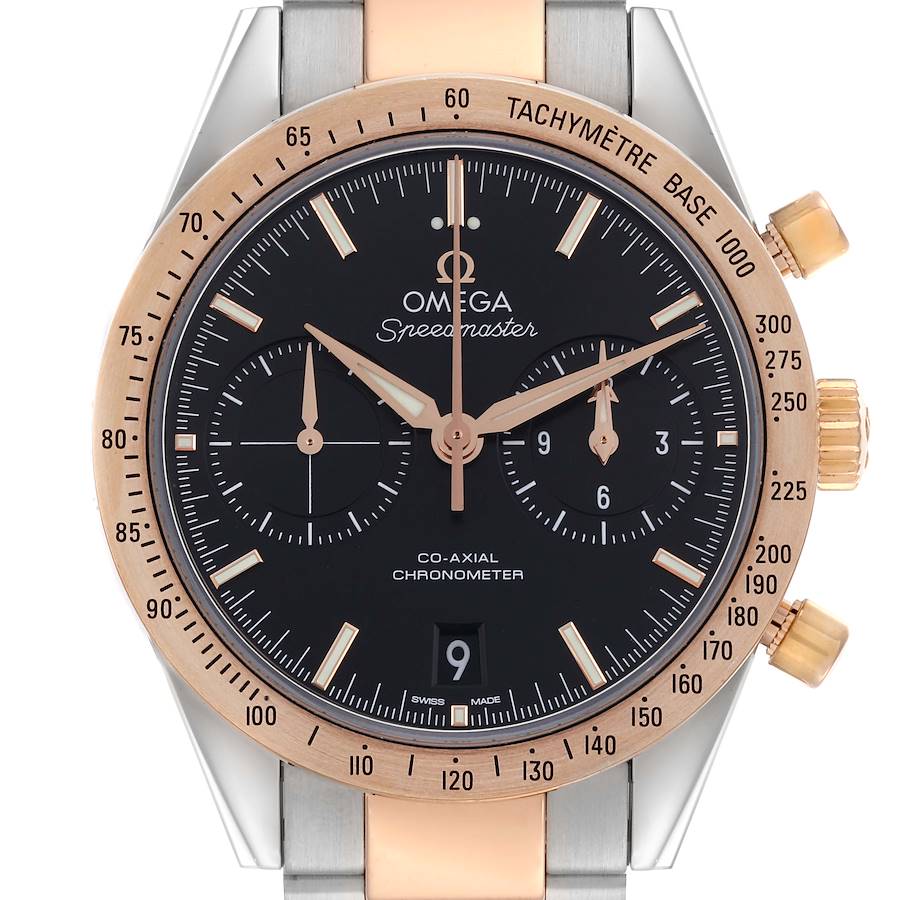 The Omega Speedmaster watch is shown from the front, highlighting the dial, bezel, and crown.