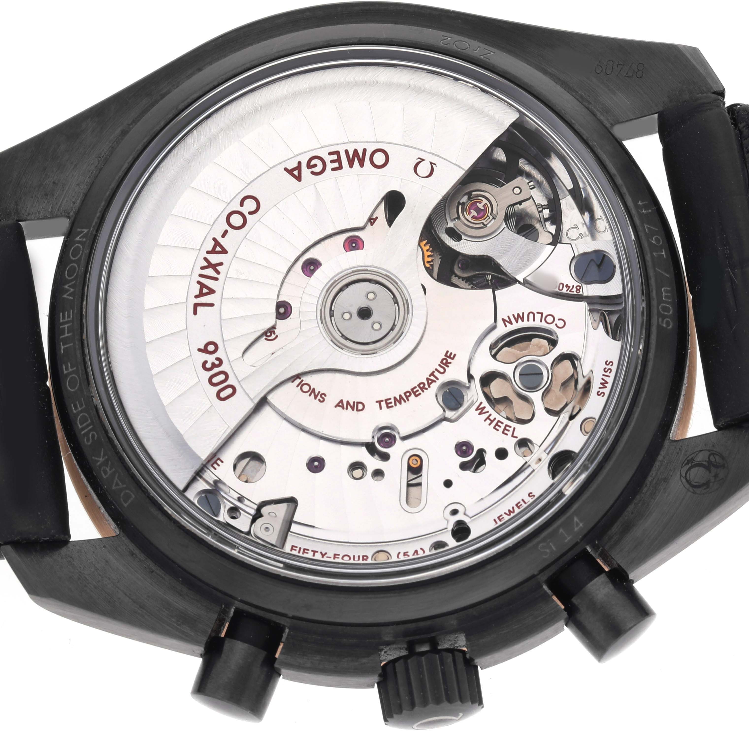 The image shows the case back of an Omega Speedmaster 311.63.44.51.06.001 Men's Ceramic Grey Dial, highlighting the movement and the Co-Axial 9300 mechanism.