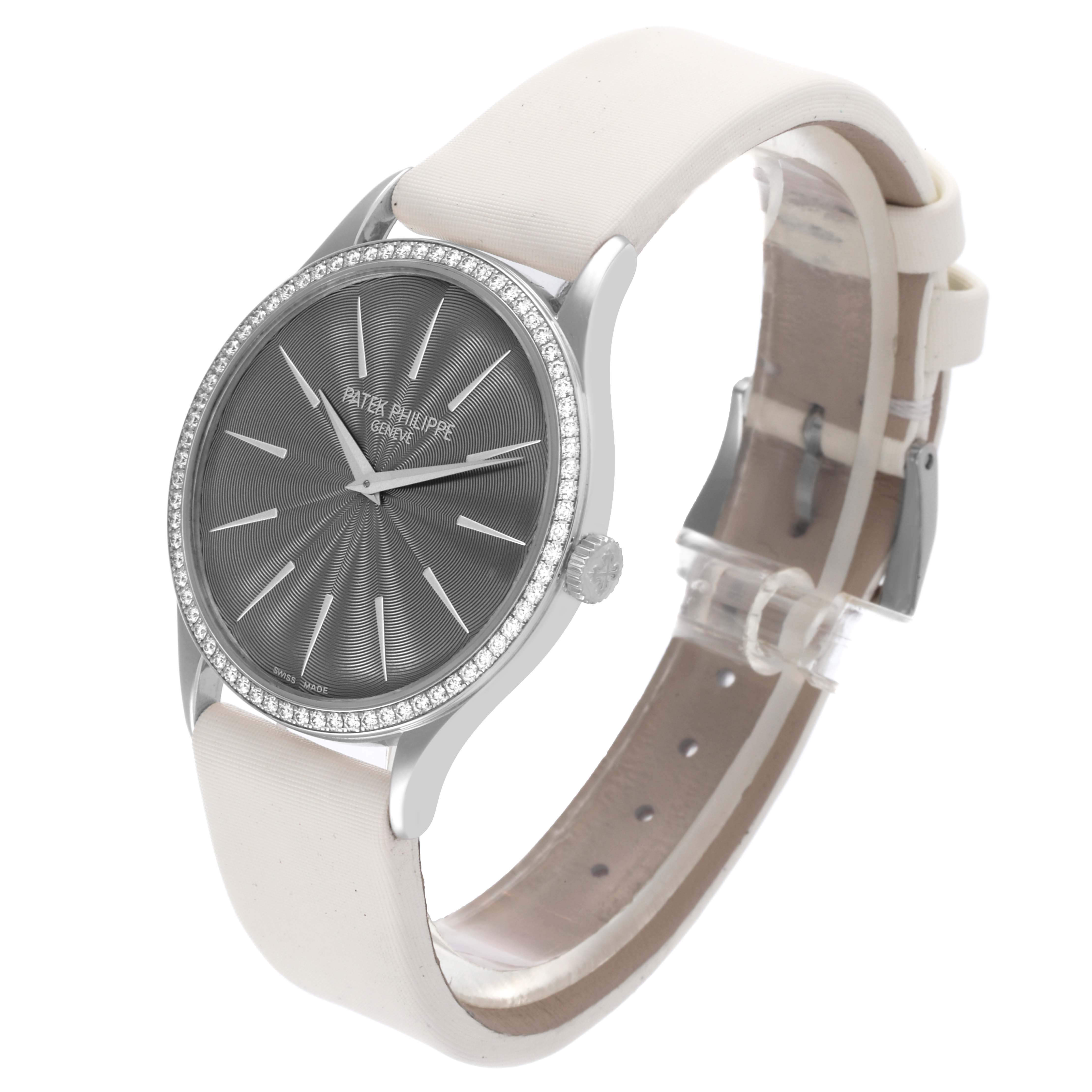 The Patek Philippe Calatrava 4897G Women's White Gold Grey Dial 4897G Women's White Gold Grey Dial watch is shown at a slight angle, highlighting the face, bezel, and strap.