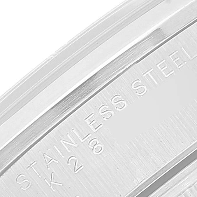 The image shows a close-up of the stainless steel casing of a Rolex Air-King 14000 Men's Stainless Steel Silver Dial 14000 Men's Stainless Steel Silver Dial watch, highlighting its engraved details.