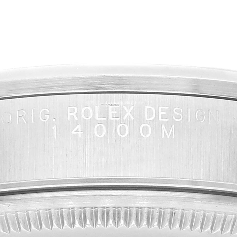 This image shows a close-up of the engravings and knurled bezel edge on the Rolex Air-King 14000 Men's Stainless Steel Silver Dial 14000 Men's Stainless Steel Silver Dial model watch.
