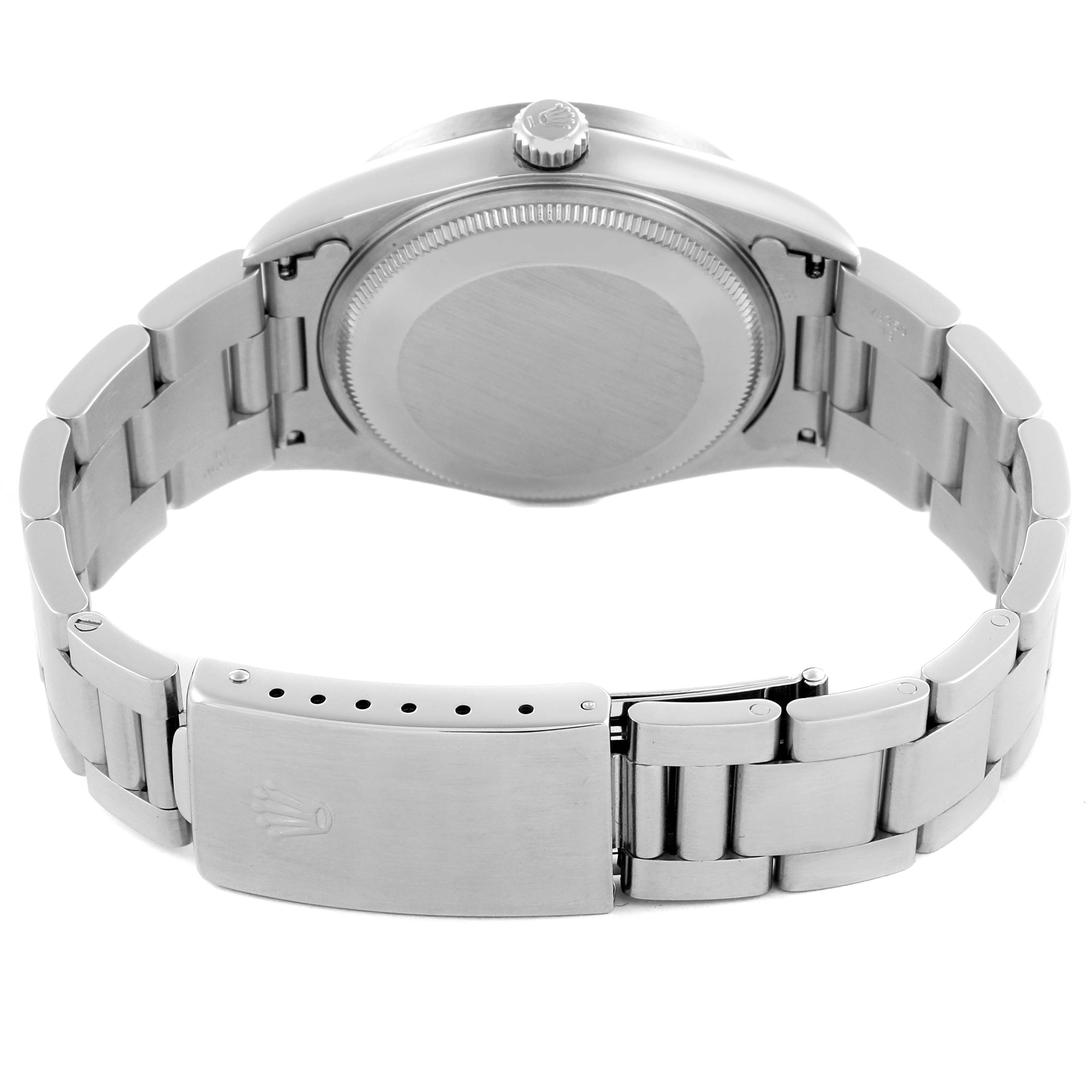 The Rolex Air-King 14010 Men's Stainless Steel Silver Dial 14010 Men's Stainless Steel Silver Dial watch is shown from the back, highlighting its case, crown, and stainless steel bracelet with clasp.