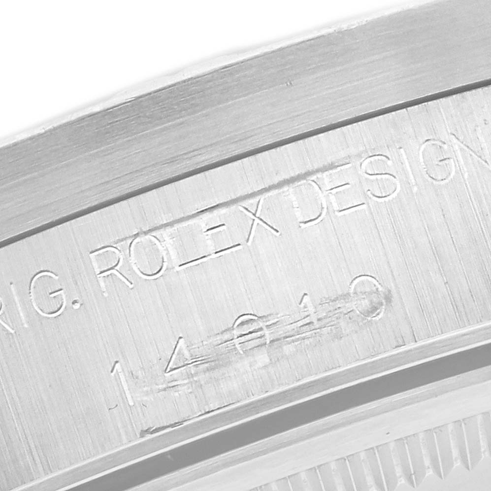 The image shows a close-up of the engraved inner bezel or case back of a Rolex Air-King 14010 Men's Stainless Steel Silver Dial 14010 Men's Stainless Steel Silver Dial watch.