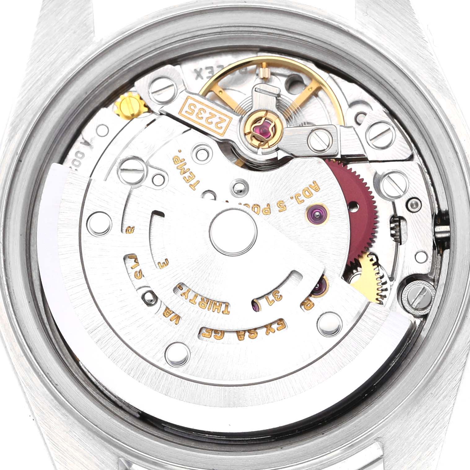 This image shows the movement of the Rolex Date 79160 Women
s Stainless Steel White Dial 79160 Women
s Stainless Steel White Dial model watch from the back, highlighting its mechanical components.