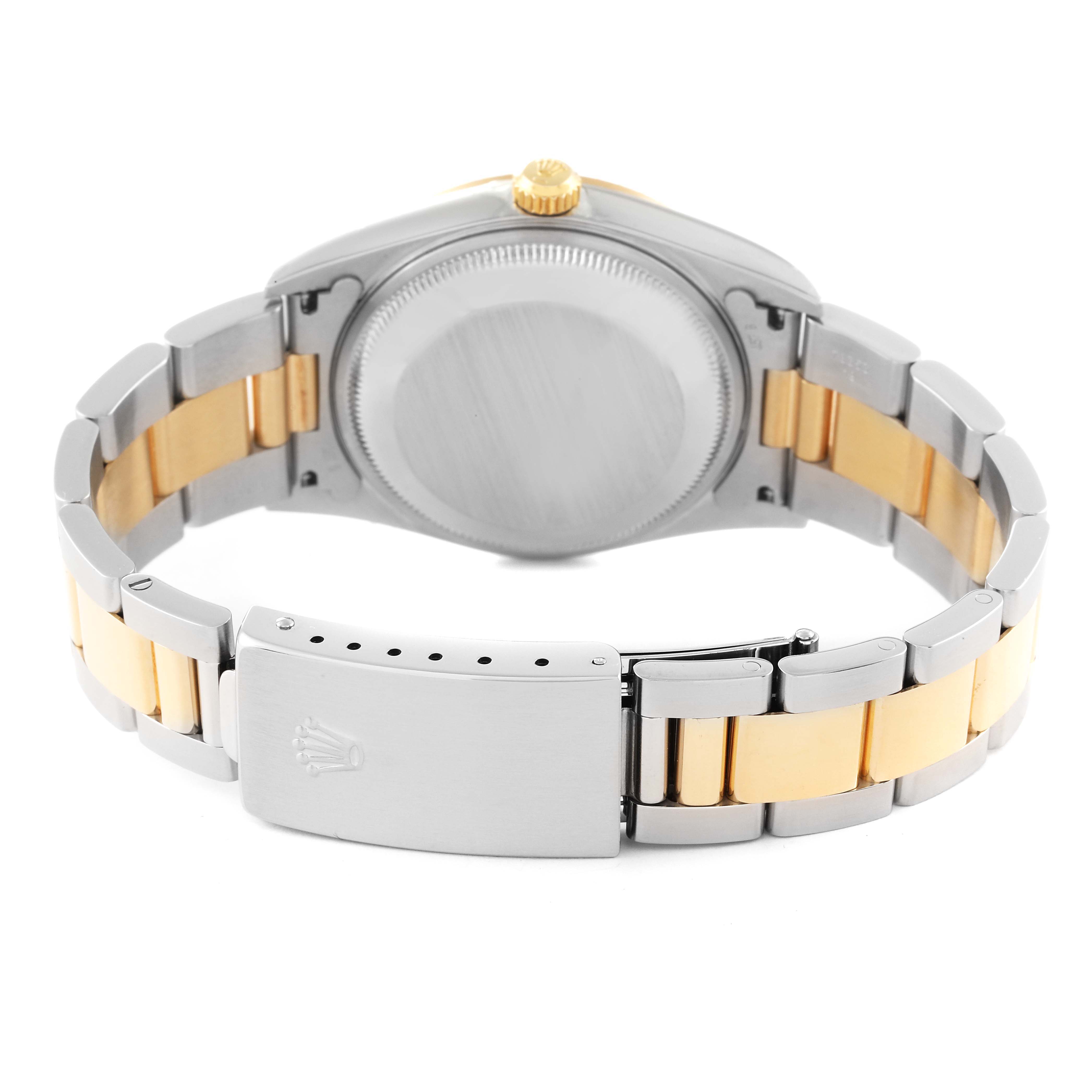 This image shows the back view of the Rolex Datejust 15223 Men's Steel and Gold (two tone) Champagne Dial 15223 Men's Steel and Gold (two tone) Champagne Dial watch, highlighting its clasp, case back, and bicolored bracelet.