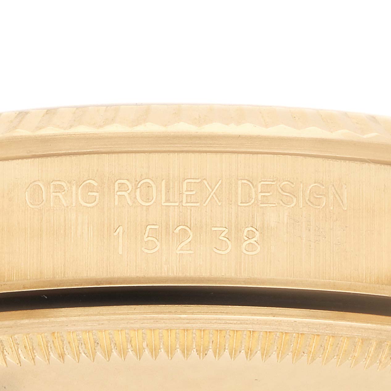 The image shows the side engraving on the case of a Rolex Date 15238 Men's Yellow Gold White Dial model with the model number "15238."