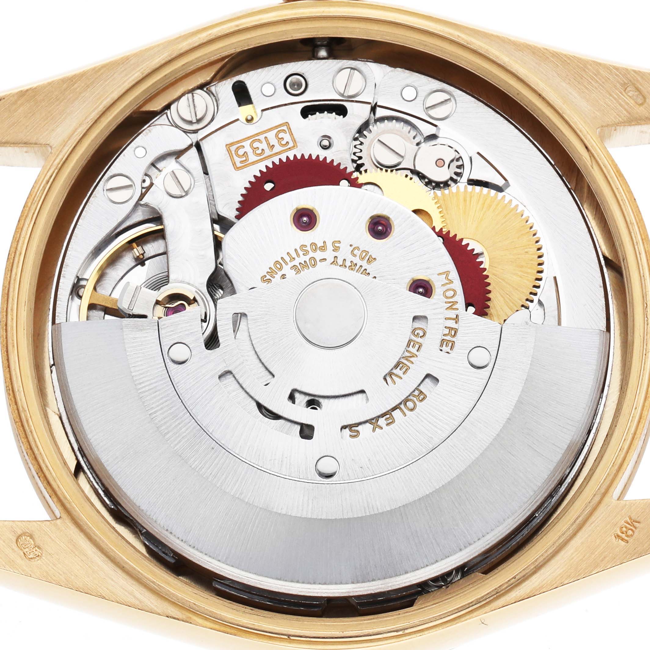The image shows the movement of a Rolex Date 15238 Men's Yellow Gold White Dial watch from the back, highlighting gears and the rotor with engravings.