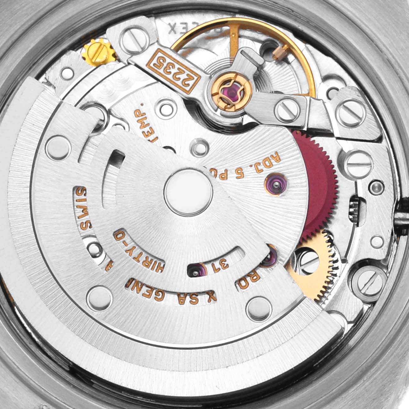 The image shows the intricate movement of a Rolex Datejust 79174 Women's Stainless Steel White Dial 79174 Women's Stainless Steel White Dial watch from a top-down angle, highlighting its mechanical components.