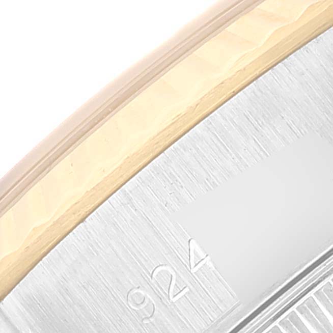 This close-up image shows a side view of the bezel and case of a Rolex Datejust 69173 Women's Steel and Gold (two tone) Champagne Dial 69173 Women's Steel and Gold (two tone) Champagne Dial watch.