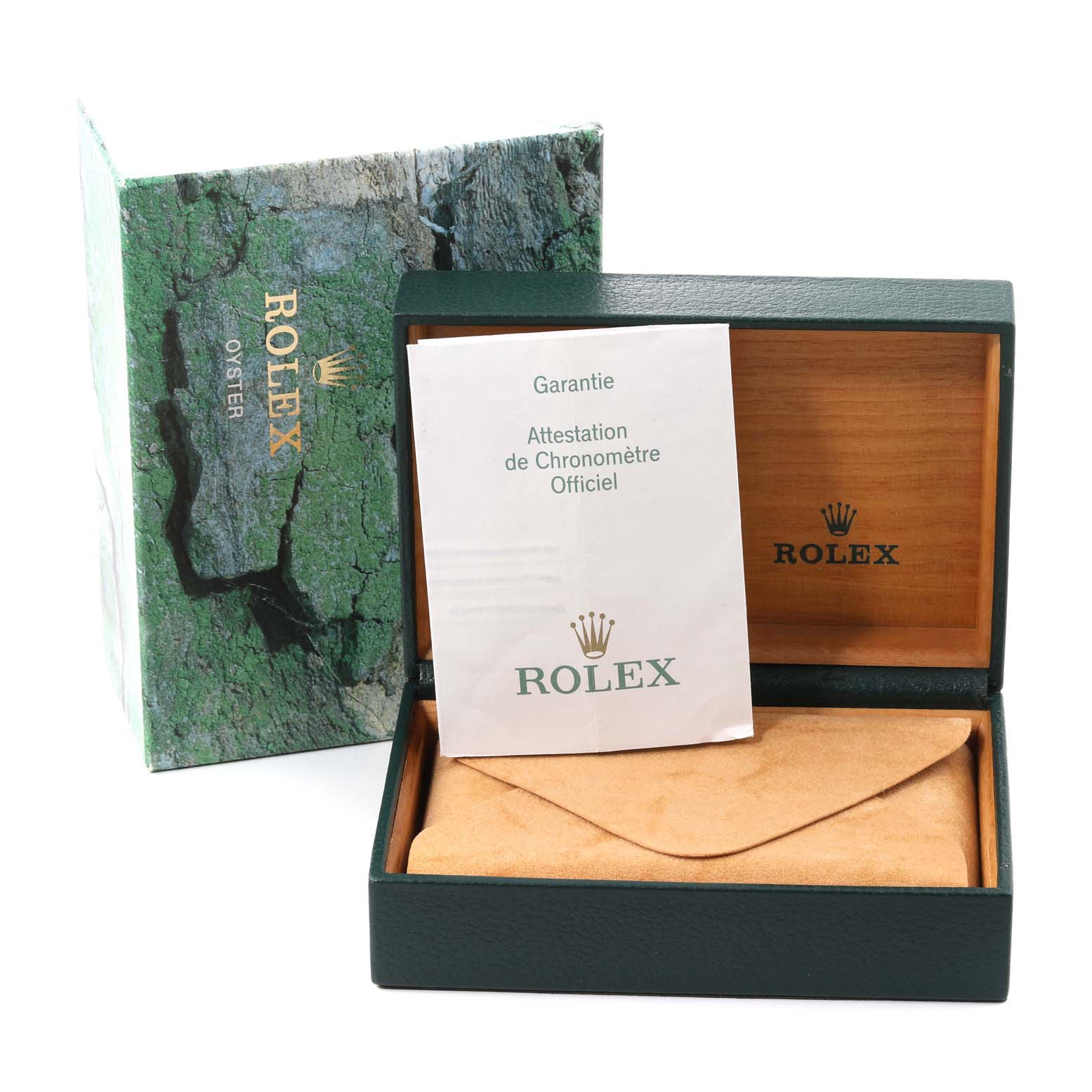 The image shows the packaging, guarantee card, and the box for a mid-size Rolex watch, open from an angle directly in front.