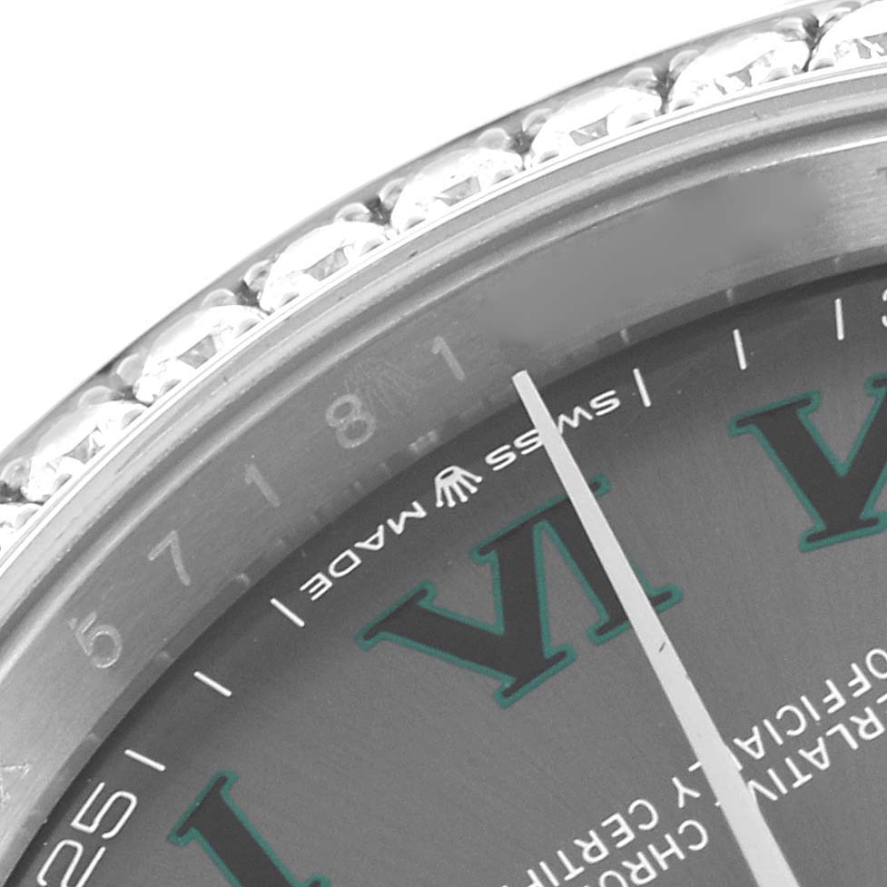 The image shows a close-up of the dial, bezel, and part of the Roman numeral markers of a Rolex Datejust 126284RBR Men's Stainless Steel Grey Dial 126284RBR Men's Stainless Steel Grey Dial watch.