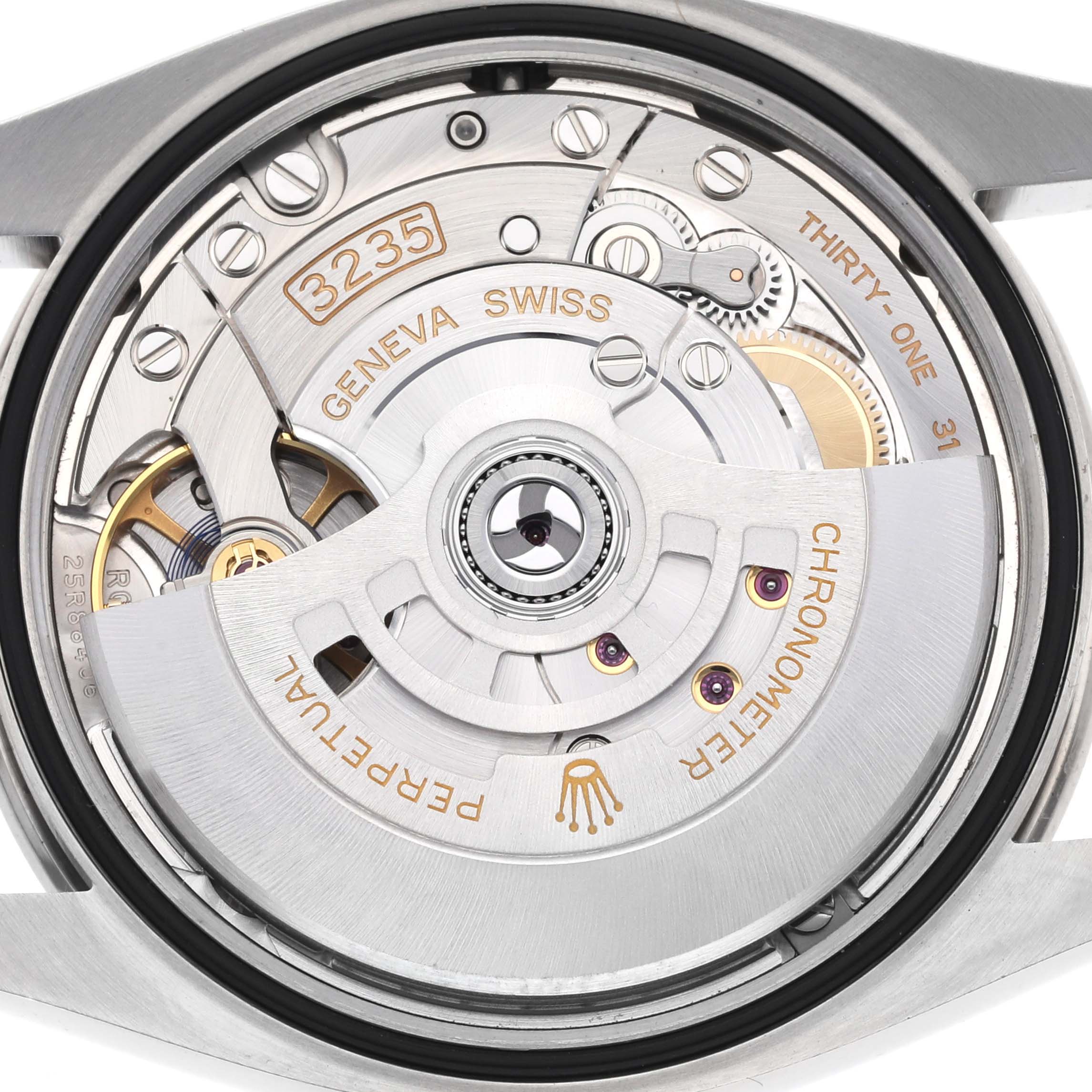 The image shows a close-up view of the movement of the Rolex Datejust 126284RBR Men's Stainless Steel Grey Dial 126284RBR Men's Stainless Steel Grey Dial, highlighting the rotor and internal gears.