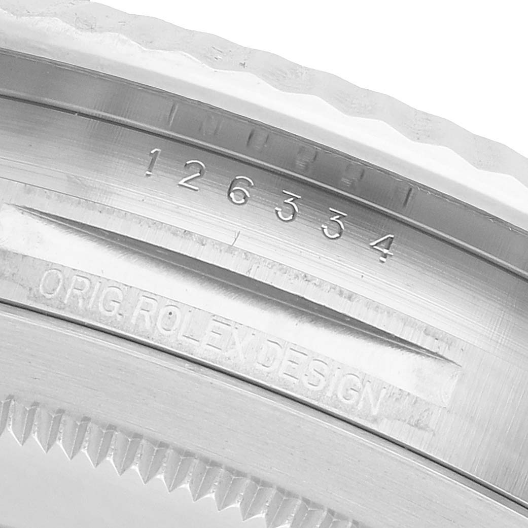 The image shows the case side of a Rolex Datejust 41 126334 Men's Stainless Steel Grey Dial, highlighting the model number and "ORIG ROLEX DESIGN" engraving.