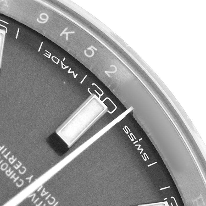 The image shows a close-up of the dial edge and bezel of a Rolex Datejust 41 126334 Men's Stainless Steel Grey Dial, highlighting the minute markers and Swiss-made label.