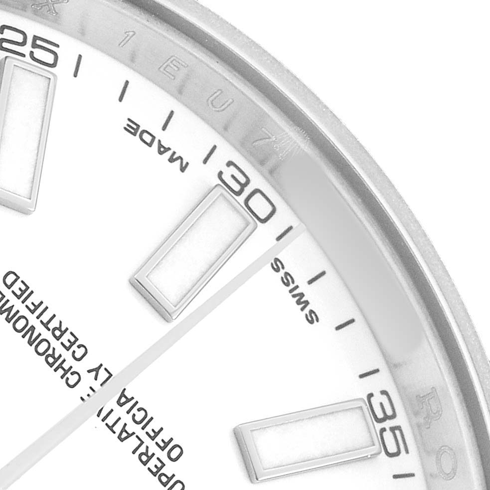 The image shows a close-up of the dial and partial bezel of a Rolex Datejust 41 116300 Men's Stainless Steel White Dial, highlighting indices and minute markers.