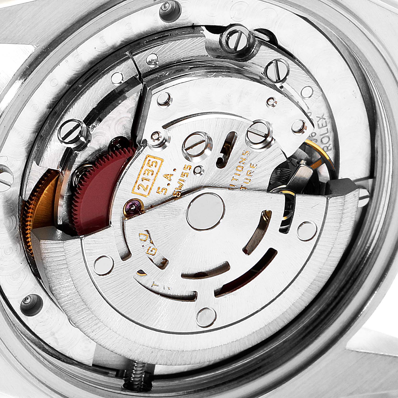 The image shows a close-up of the internal mechanism of a Rolex Mid-Size 68273 Women's Steel and Gold (two tone) Champagne Dial 68273 Women's Steel and Gold (two tone) Champagne Dial model watch, focusing on the movement components.