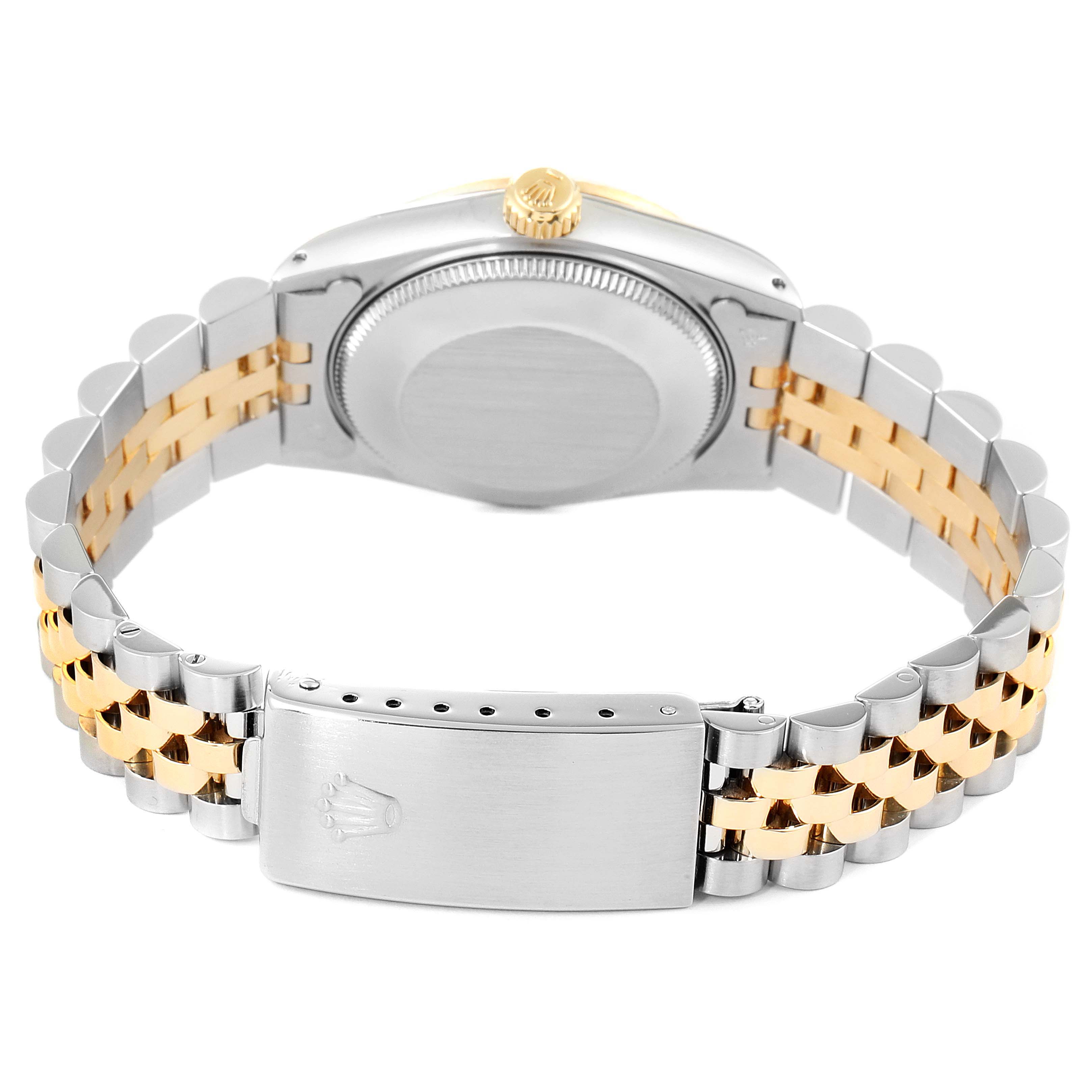The image shows the back and bracelet of a Rolex Mid-Size 68273 Women's Steel and Gold (two tone) Champagne Dial 68273 Women's Steel and Gold (two tone) Champagne Dial model watch, emphasizing the clasp and crown.