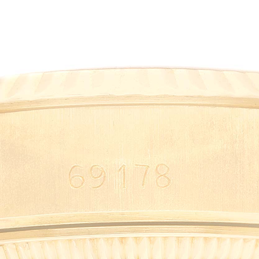 This image shows a close-up of the model number engraving "69178" on the President model by Rolex.