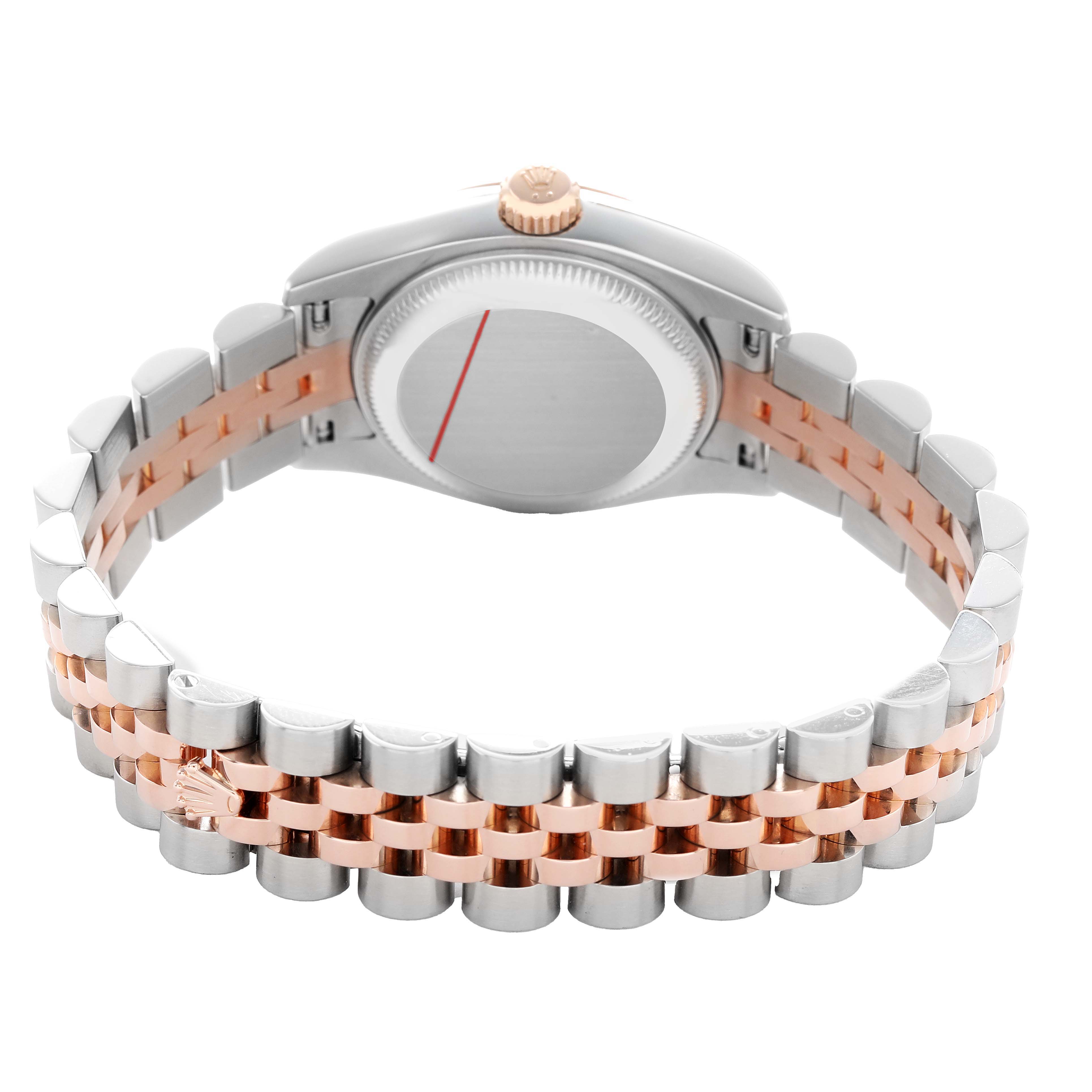 The Rolex Datejust 179171 Women's Steel and Gold (two tone) Pink Dial watch is shown from the back, highlighting its case back and two-tone bracelet.
