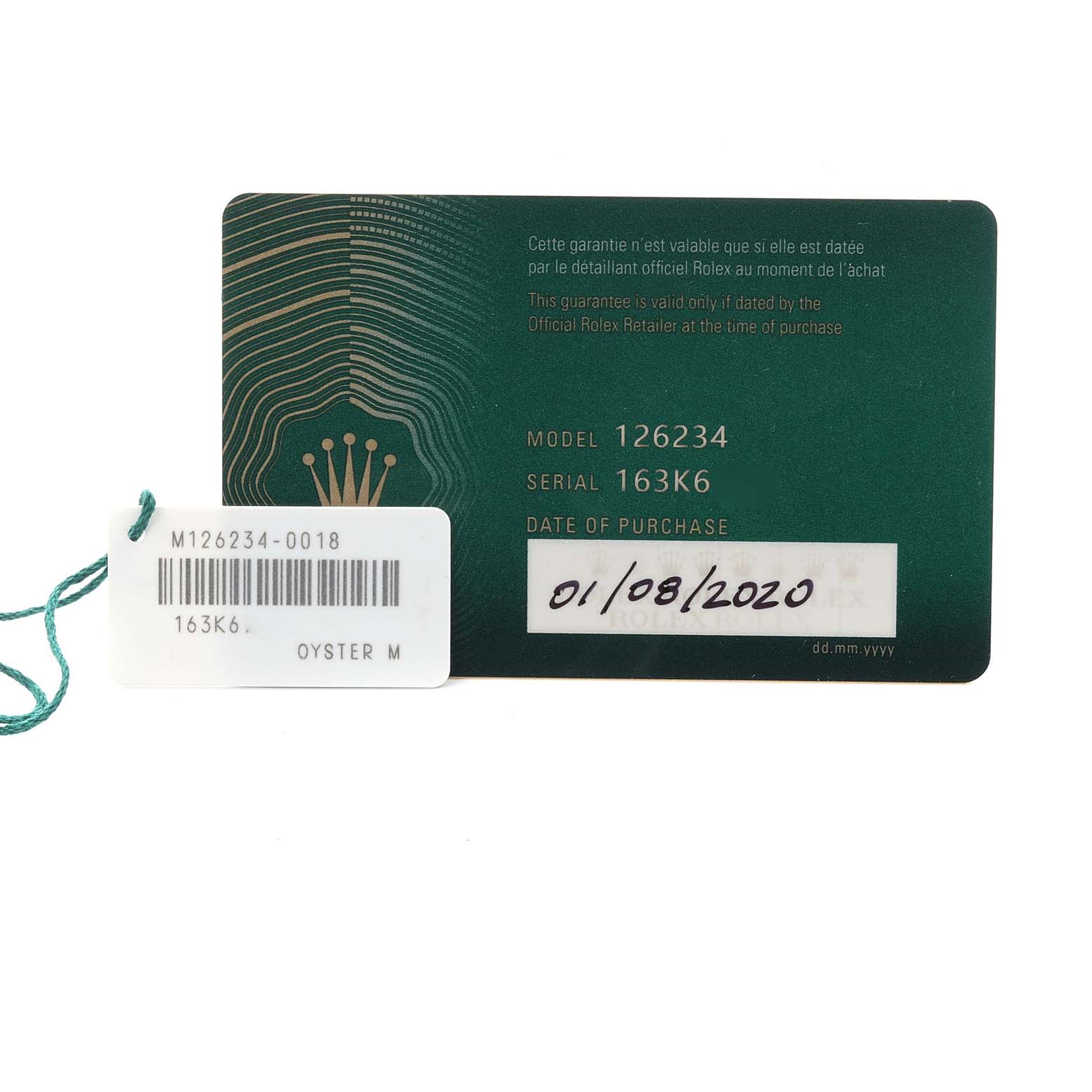 The image shows a Rolex Datejust 126234 Men's Stainless Steel Blue Dial 126234 Men's Stainless Steel Blue Dial model card and a tag with model and serial numbers.