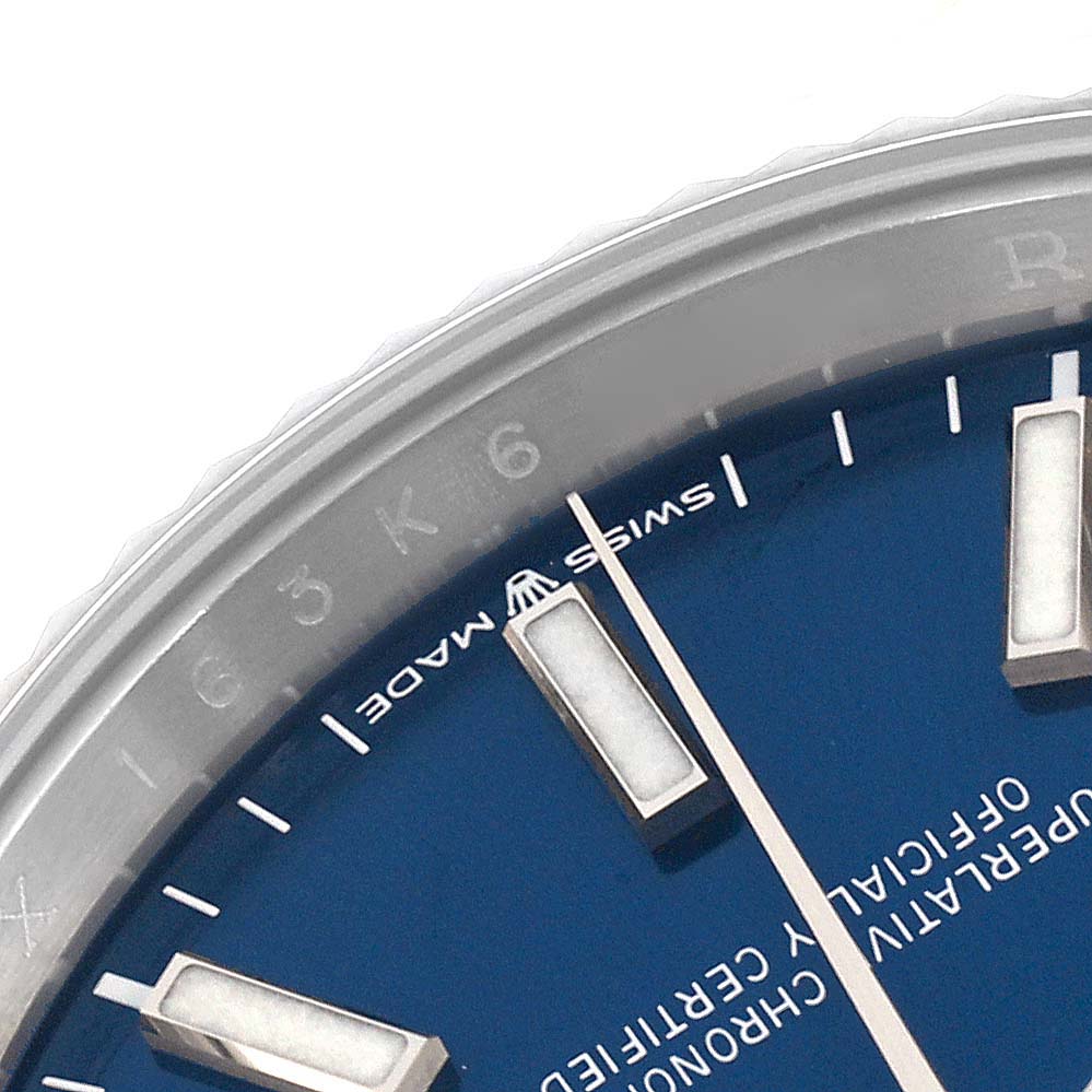 The image shows a partial close-up of the blue dial and markers on a Rolex Datejust 126234 Men's Stainless Steel Blue Dial 126234 Men's Stainless Steel Blue Dial watch.