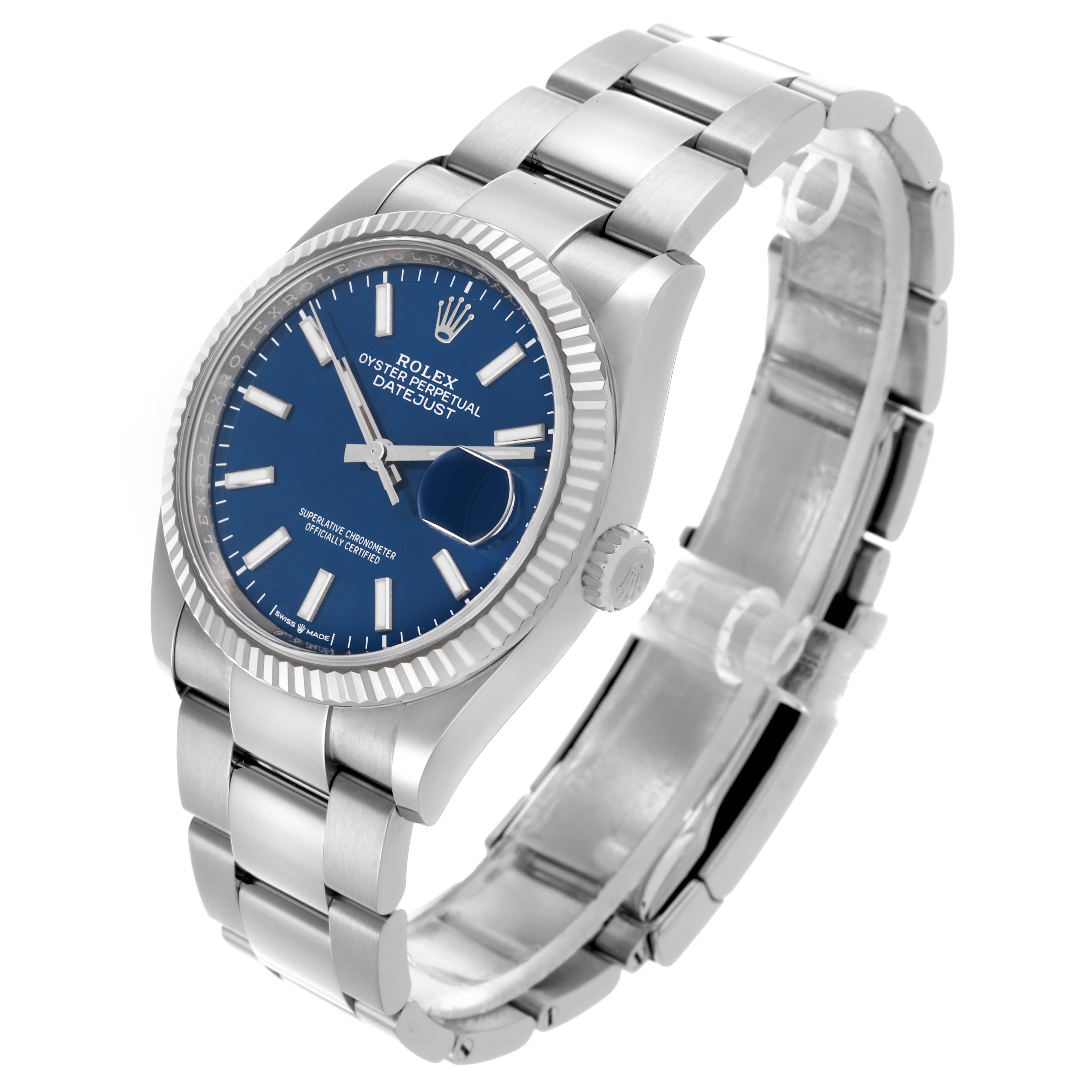 The Rolex Datejust 126234 Men's Stainless Steel Blue Dial 126234 Men's Stainless Steel Blue Dial watch is shown from an angled top view, highlighting the face, bezel, and bracelet.